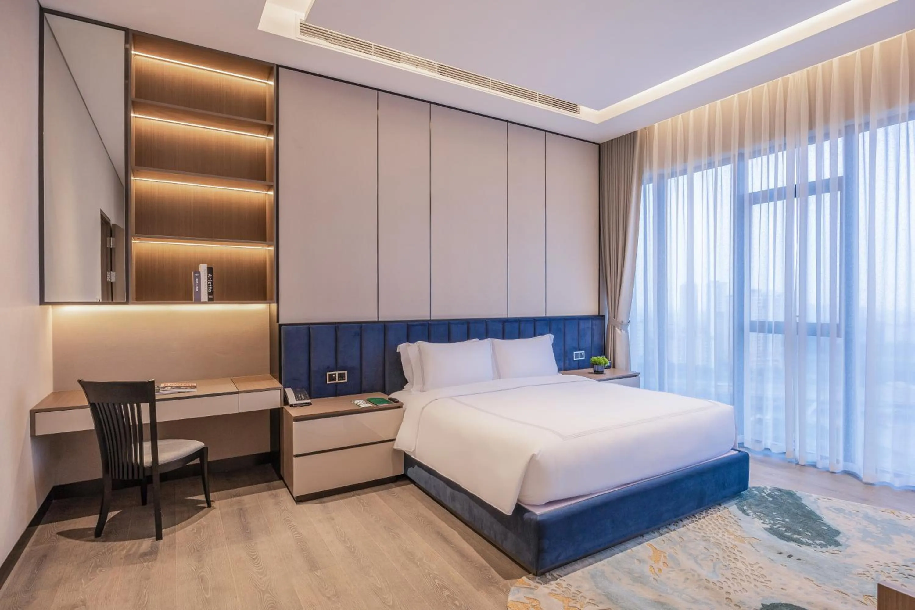 Bed in Fraser Residence Hanoi