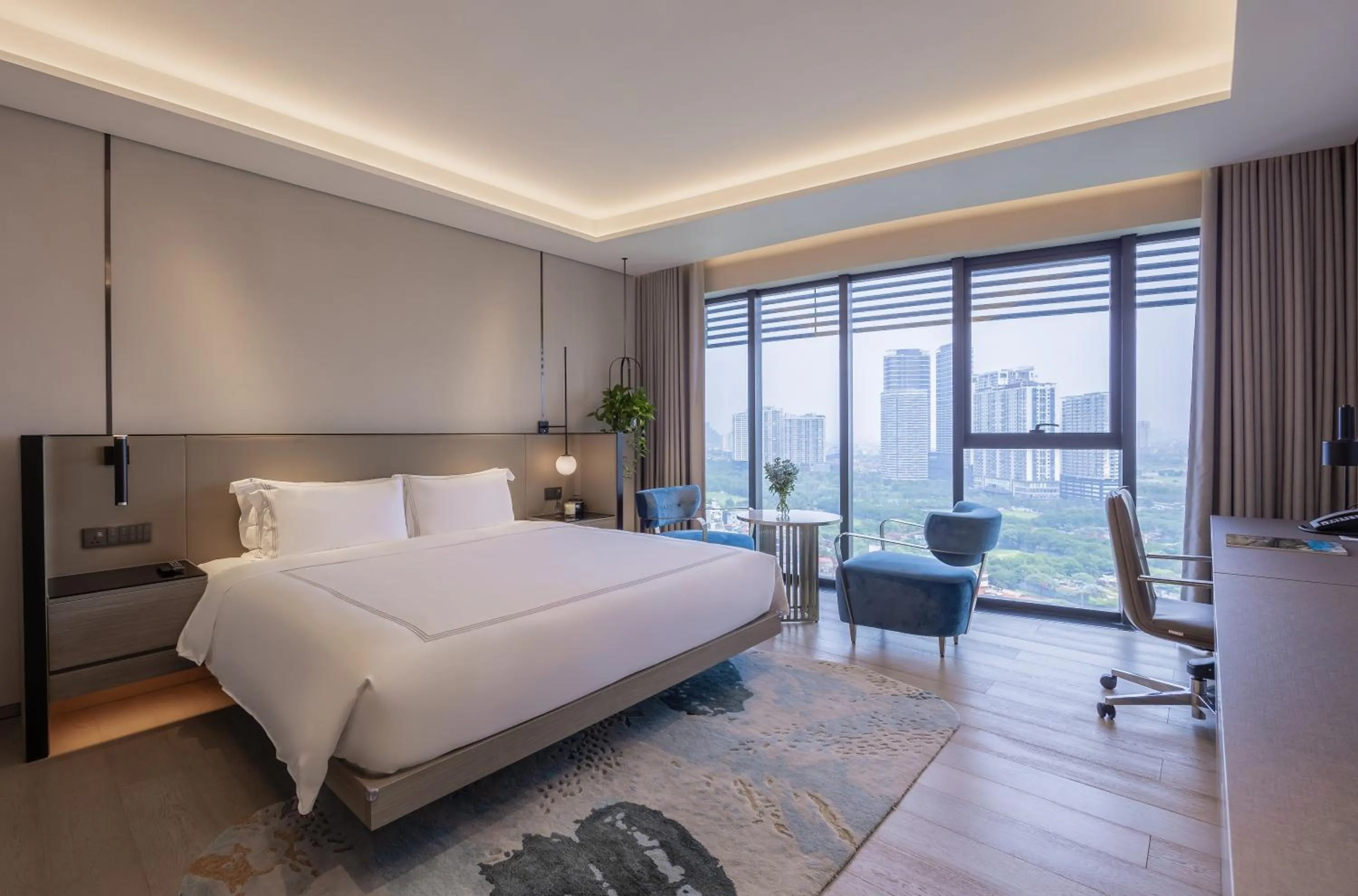 Bed in Fraser Residence Hanoi