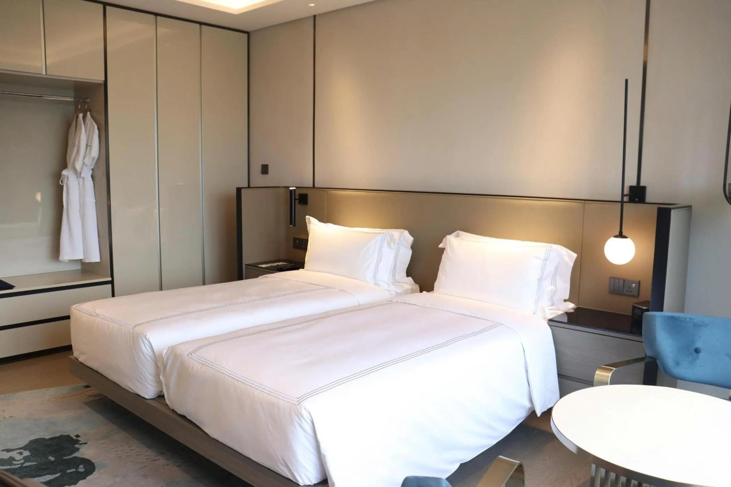 Bed in Fraser Residence Hanoi