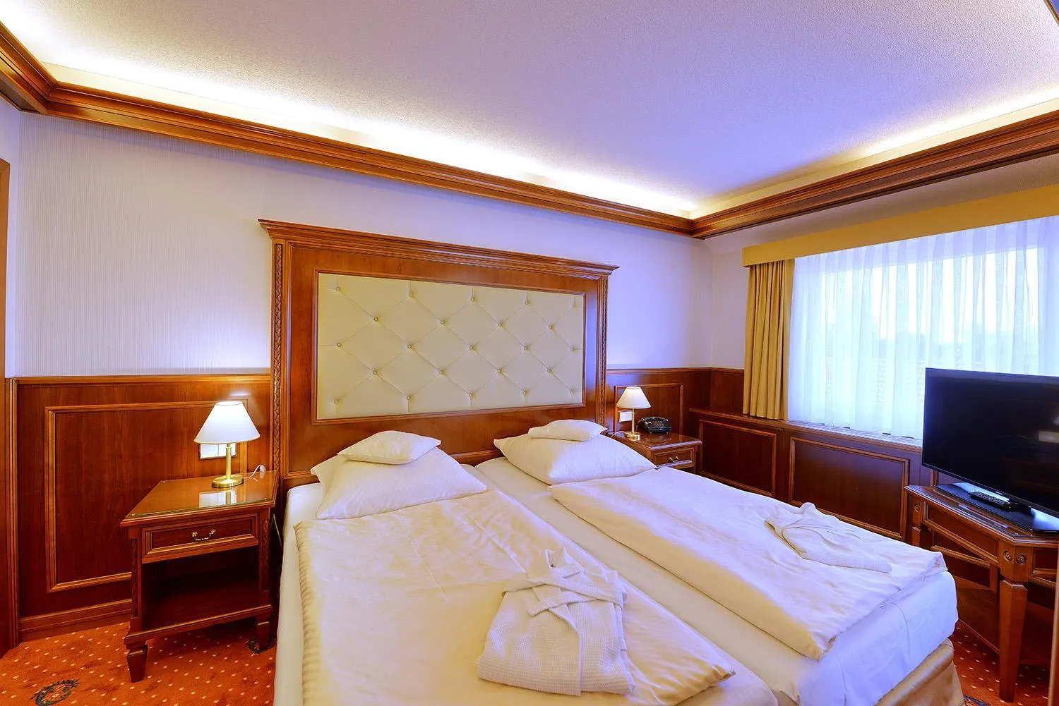 Photo of the whole room, Bed in Parkhotel Stader Hof