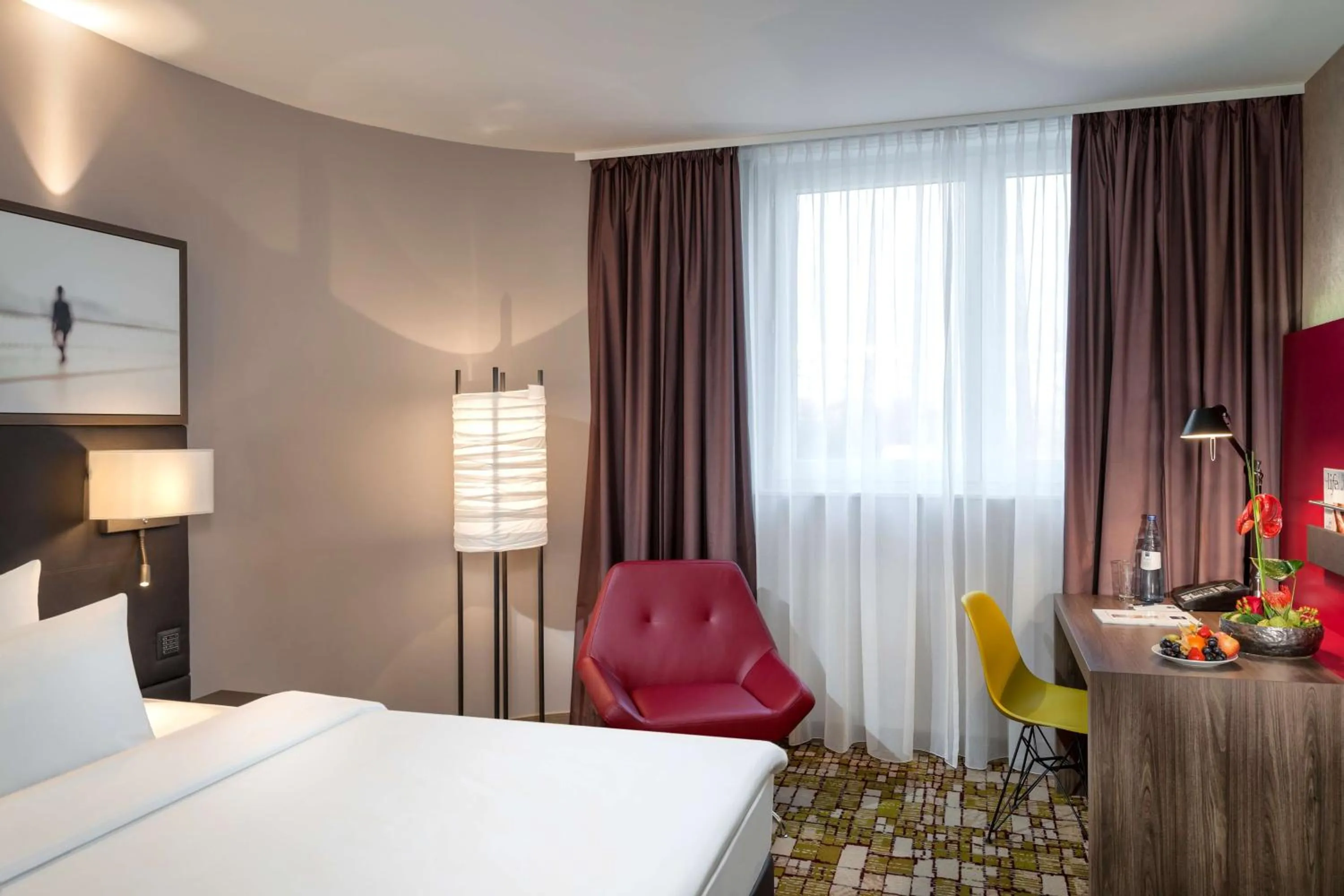 Photo of the whole room, Bed in Dorint Airport-Hotel Zürich
