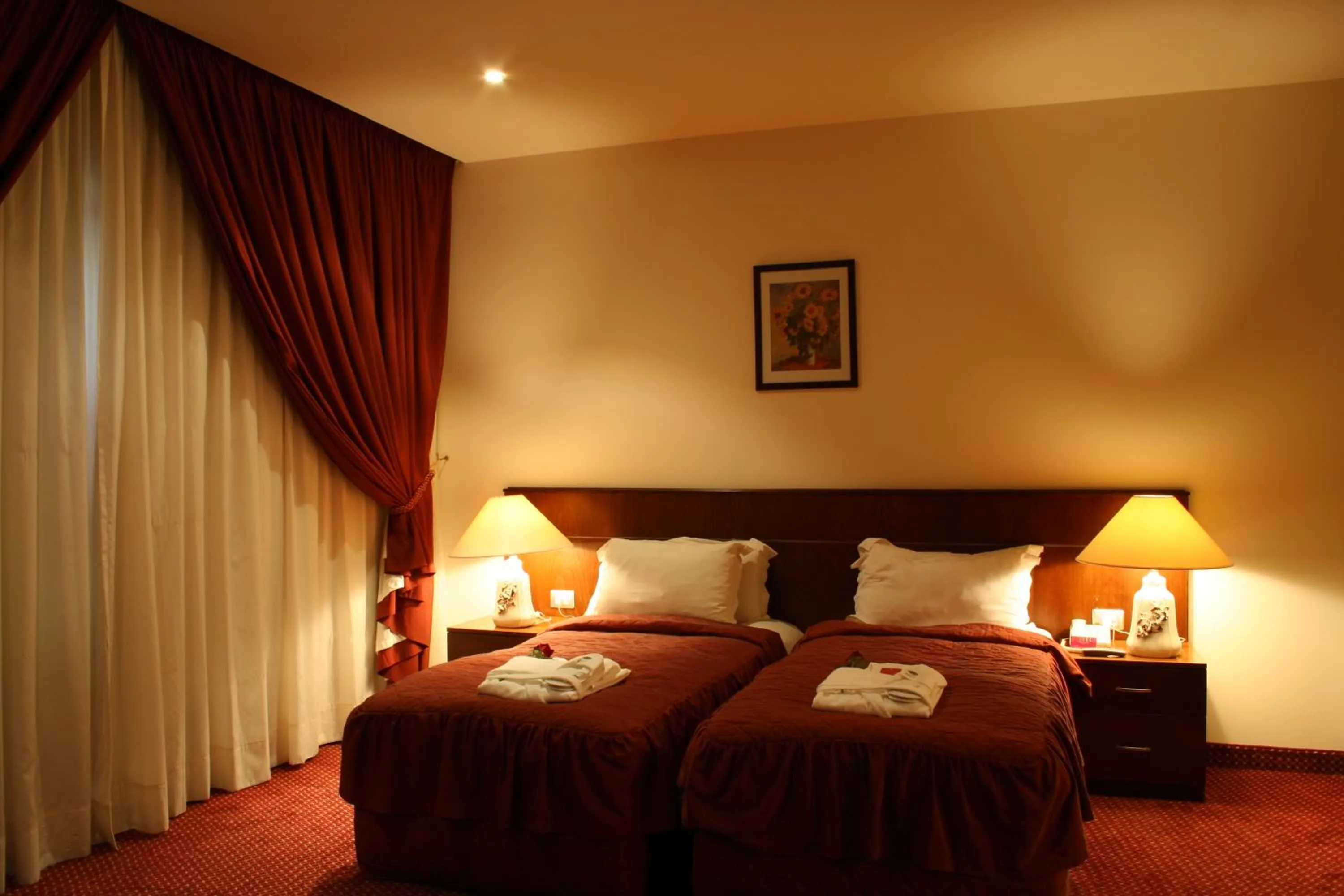Bed in Markazia Suites