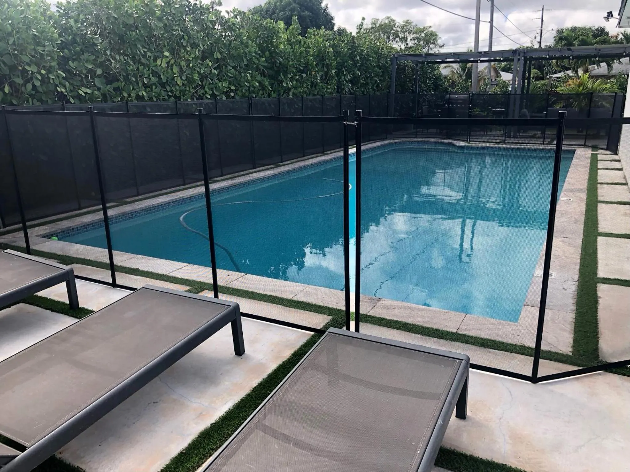Patio in Magical Miami Retreat with Heated Pool, Mini Golf, and Basketball Court L19