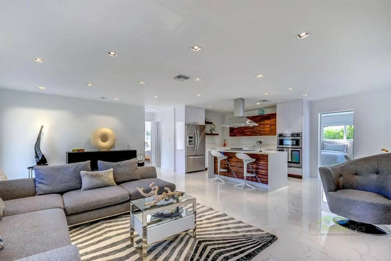 Kitchen or kitchenette in Magical Miami Retreat with Heated Pool, Mini Golf, and Basketball Court L19