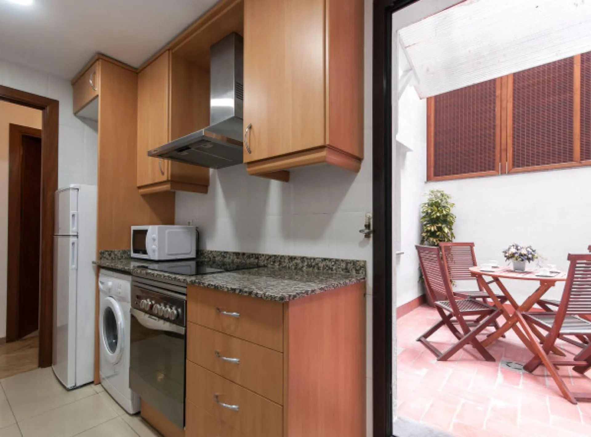 Kitchen or kitchenette in Picasso Suites