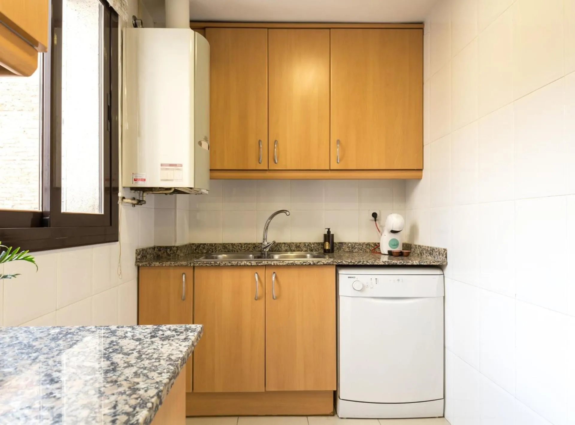 Kitchen or kitchenette in Picasso Suites