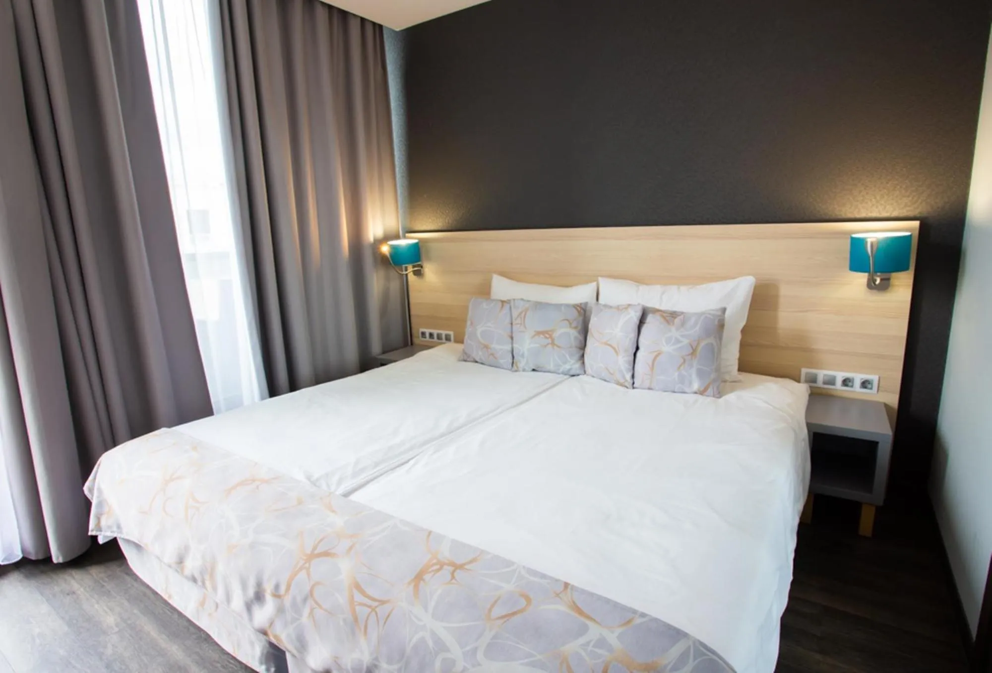 Bed in Hotel Regnum Residence