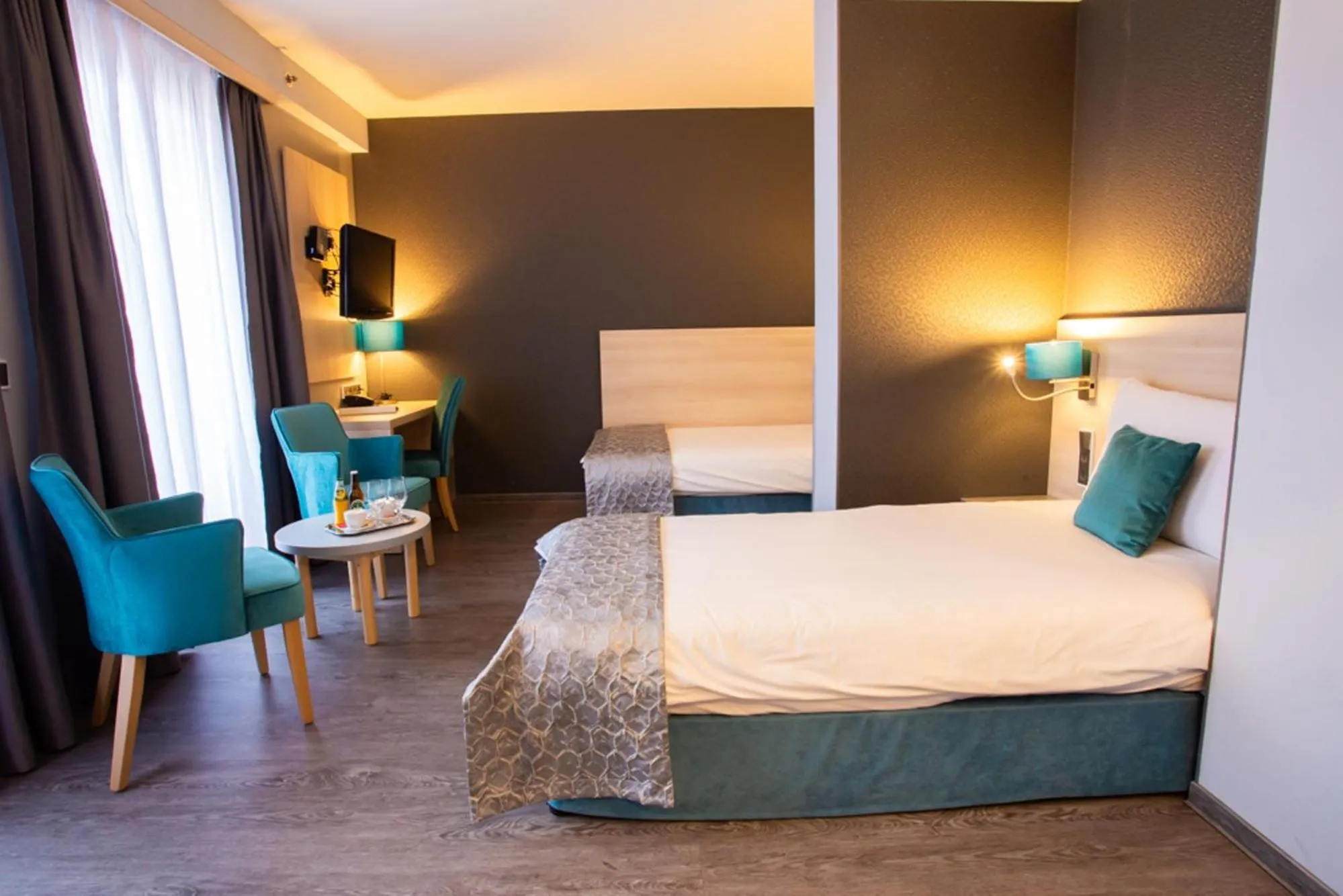 Bed in Hotel Regnum Residence