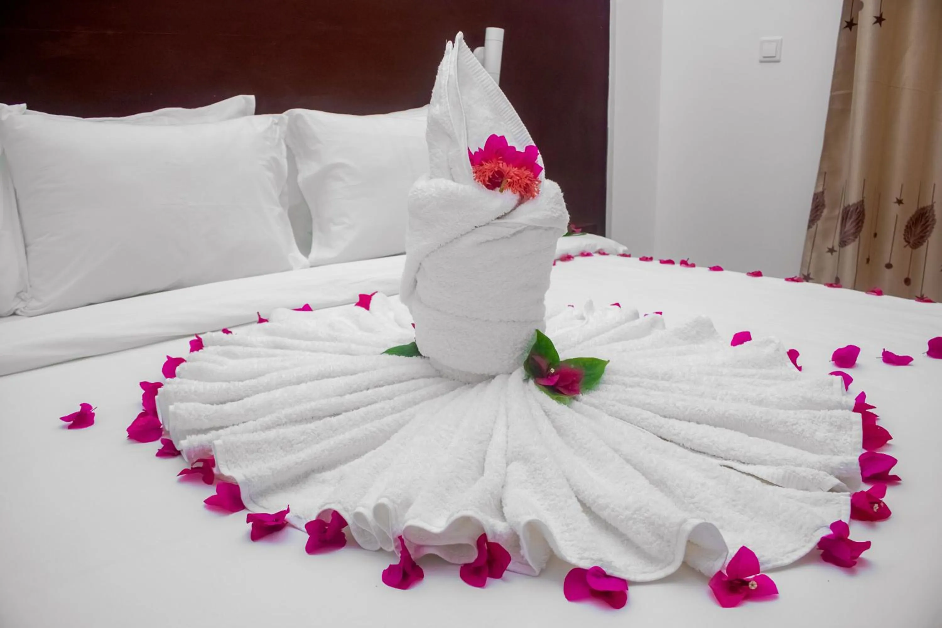 Bed in Malika Nungwi Hotel