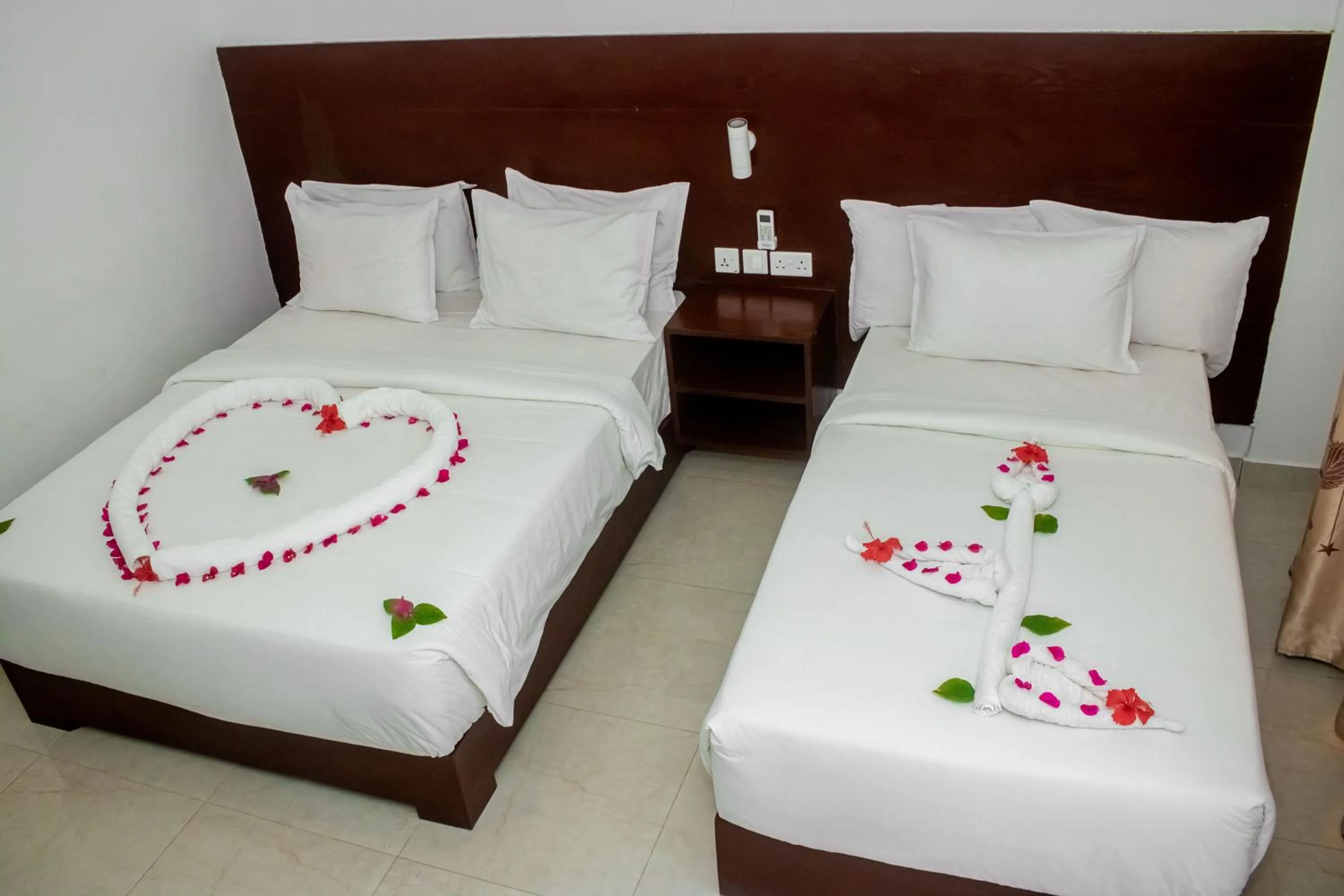 Bed in Malika Nungwi Hotel