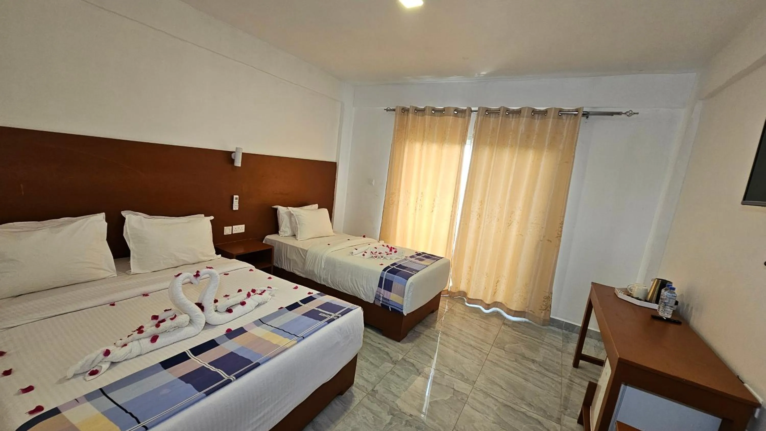 Bed in Malika Nungwi Hotel