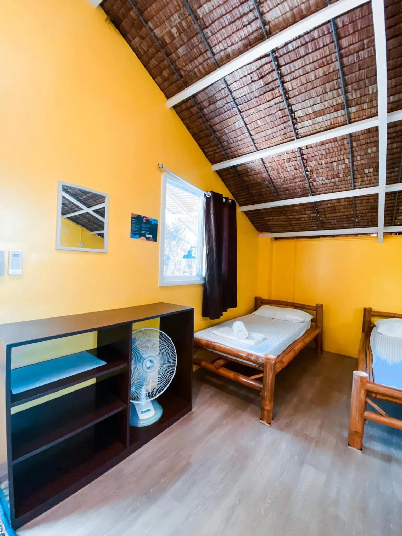 Bed in In Dai Aquasports and Beach Resort