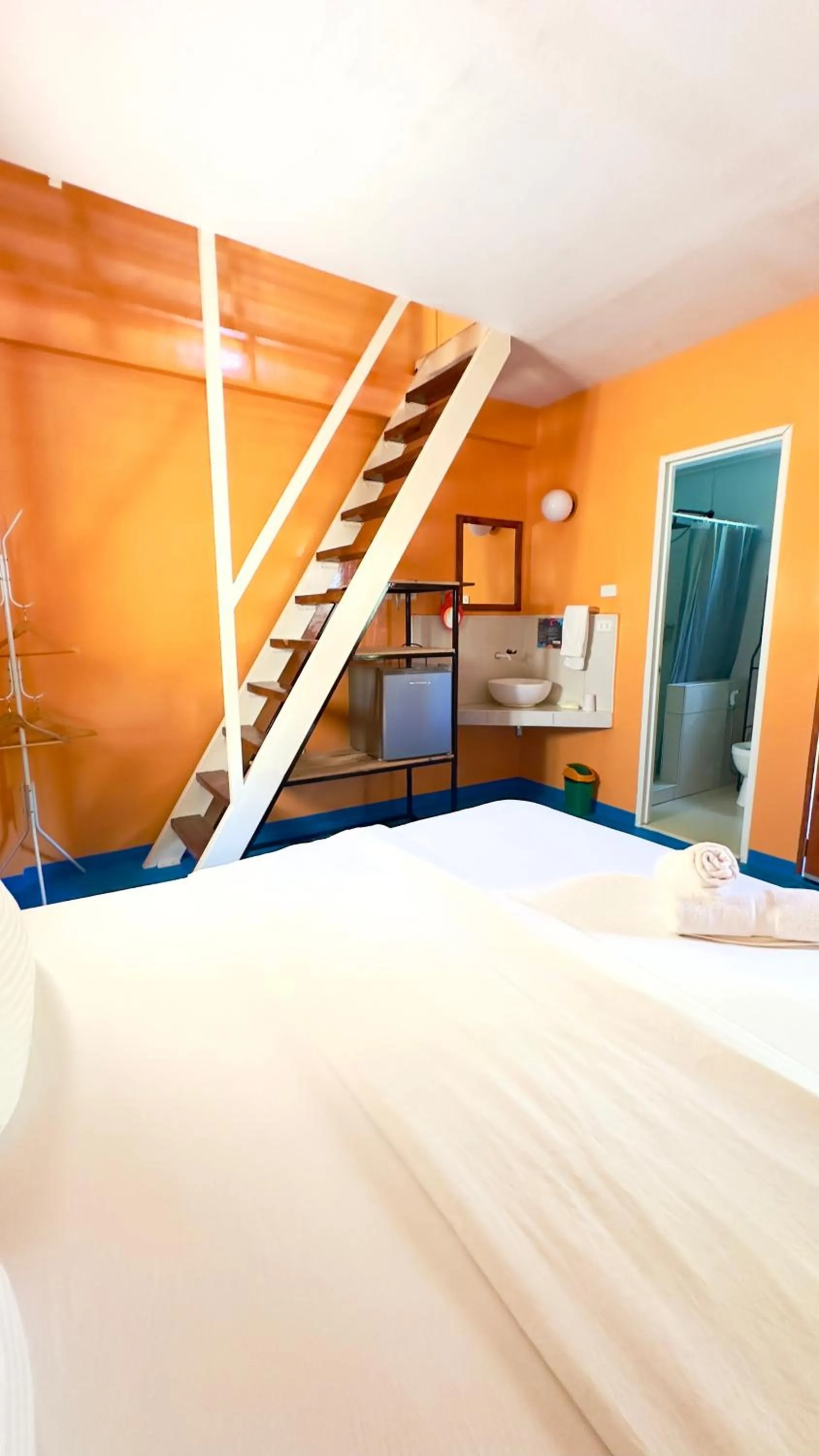 Bathroom, Bed in In Dai Aquasports and Beach Resort