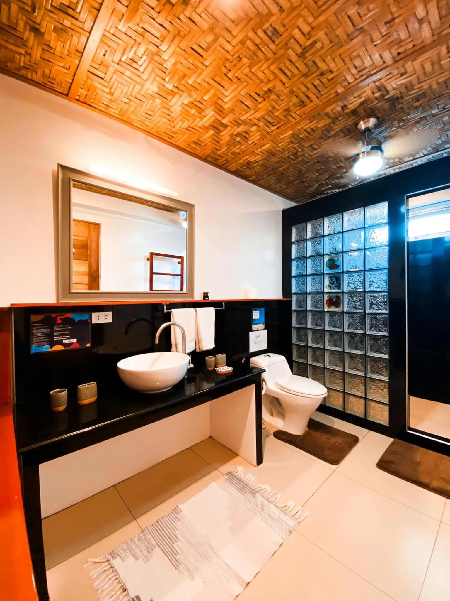 Shower, Bed in In Dai Aquasports and Beach Resort