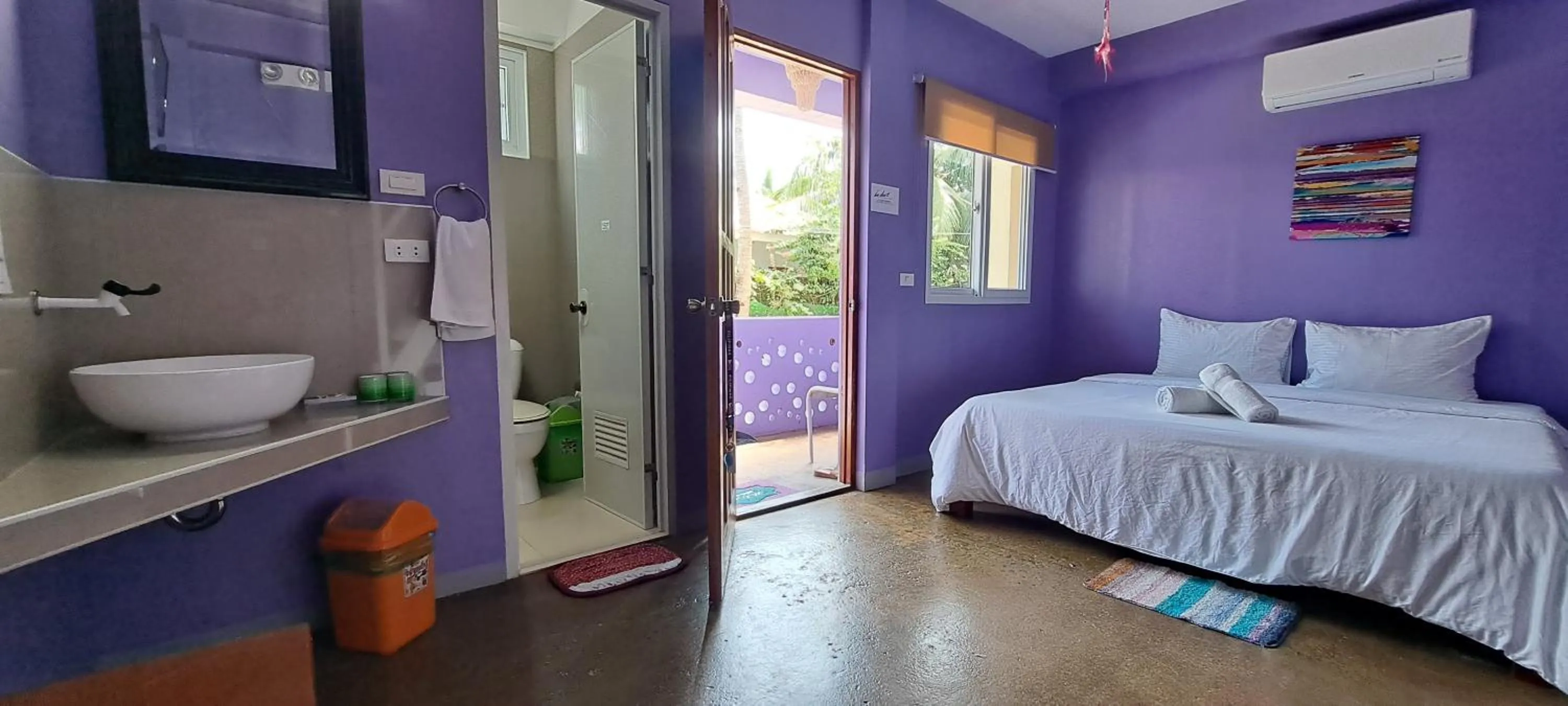 Bed in In Dai Aquasports and Beach Resort