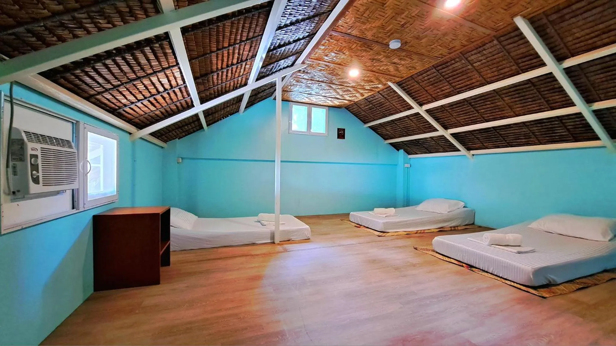 Bed in In Dai Aquasports and Beach Resort