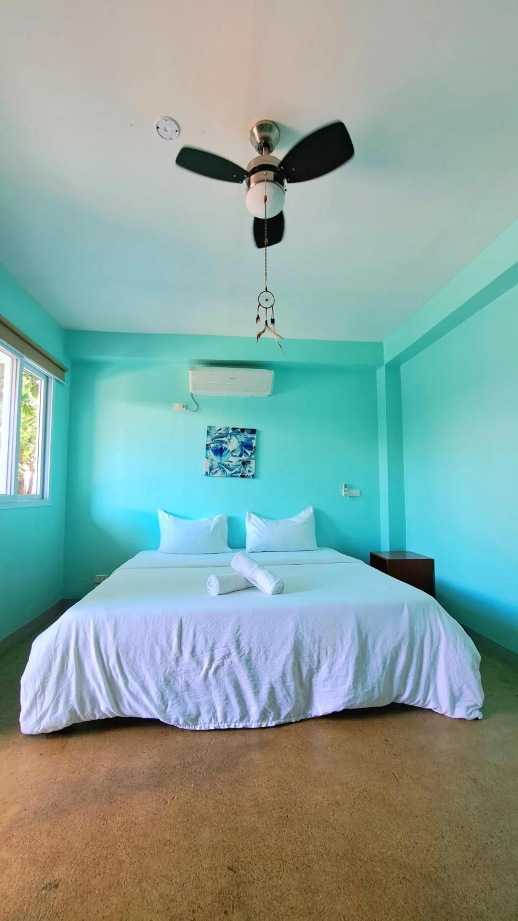 Bed in In Dai Aquasports and Beach Resort