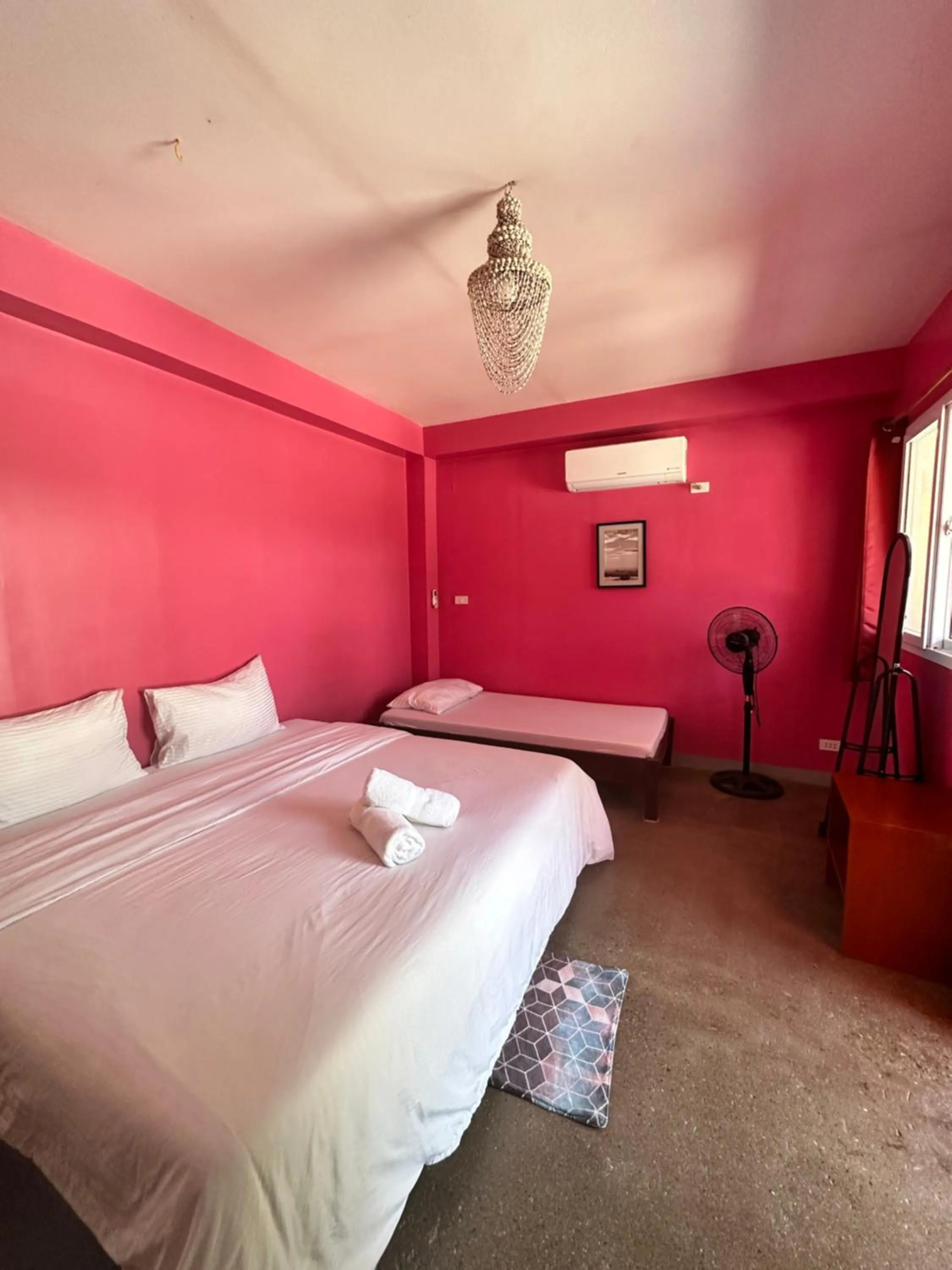 Bed in In Dai Aquasports and Beach Resort