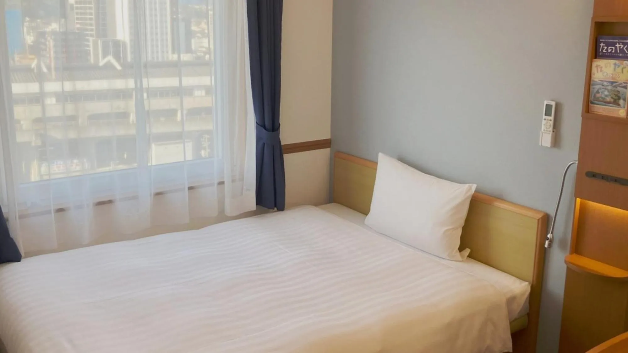 Bedroom, Bed in Toyoko Inn Shin-yamaguchi-eki Shinkansen-guchi