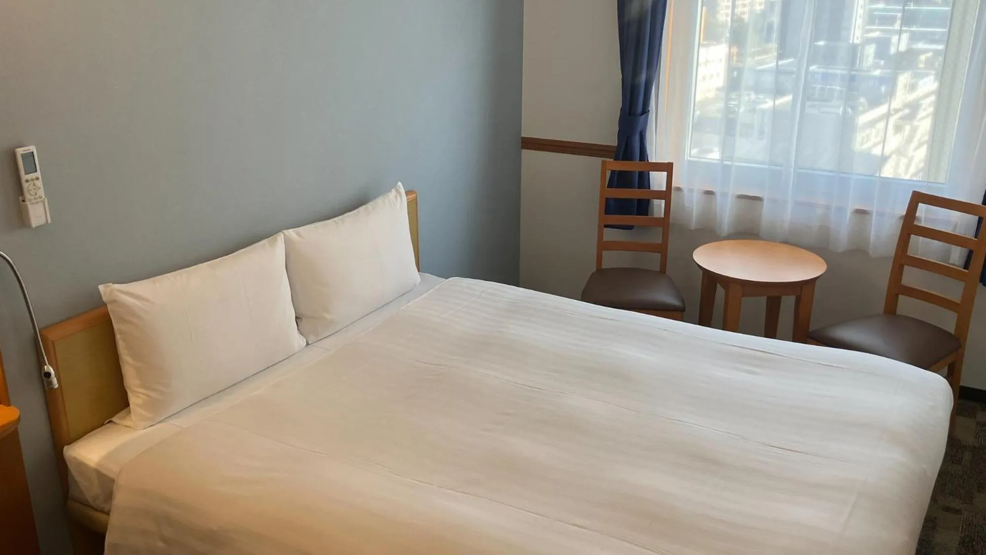 Bedroom, Bed in Toyoko Inn Shin-yamaguchi-eki Shinkansen-guchi