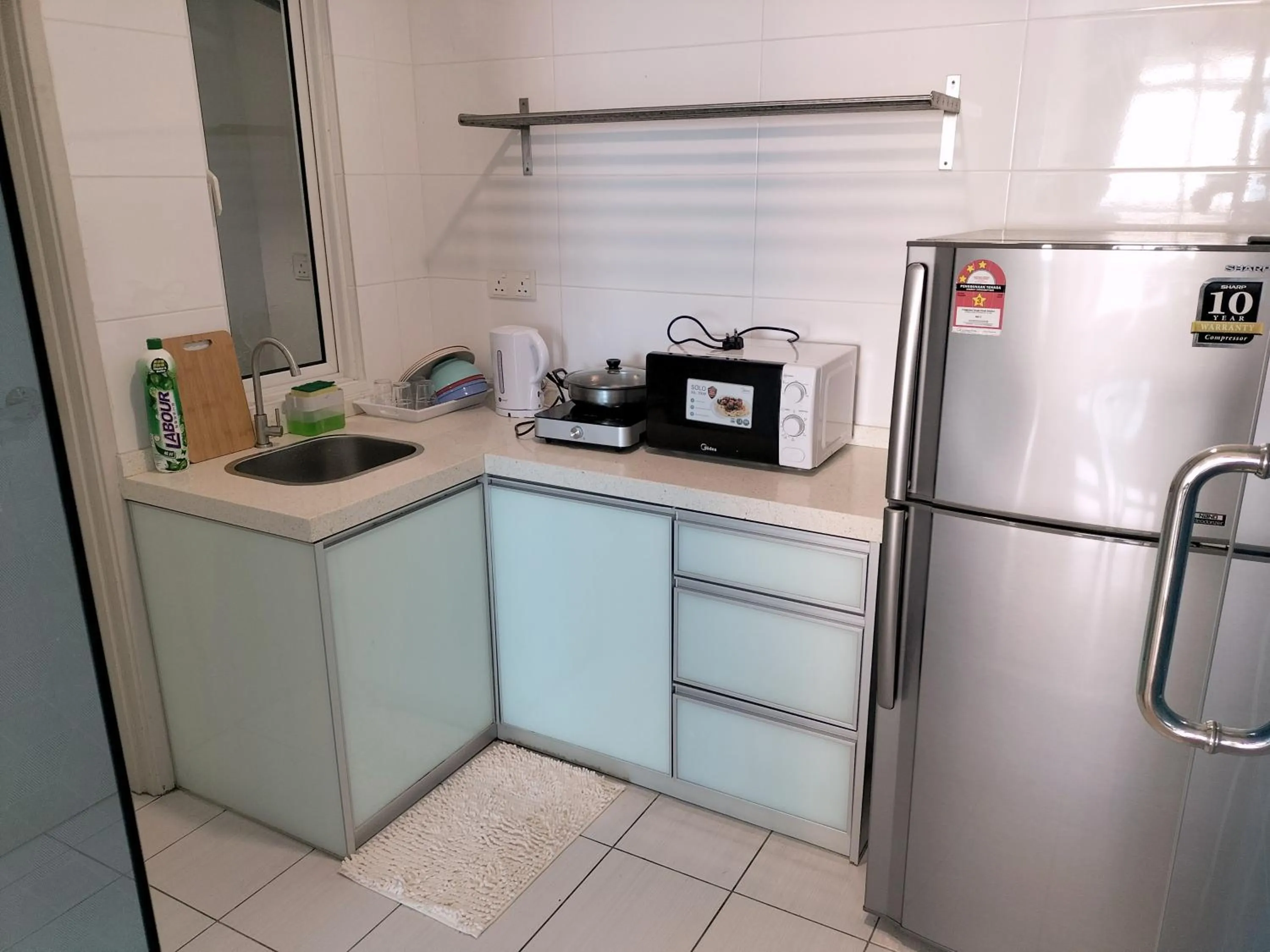 Kitchen or kitchenette in My Home The Wave Malacca Homestay