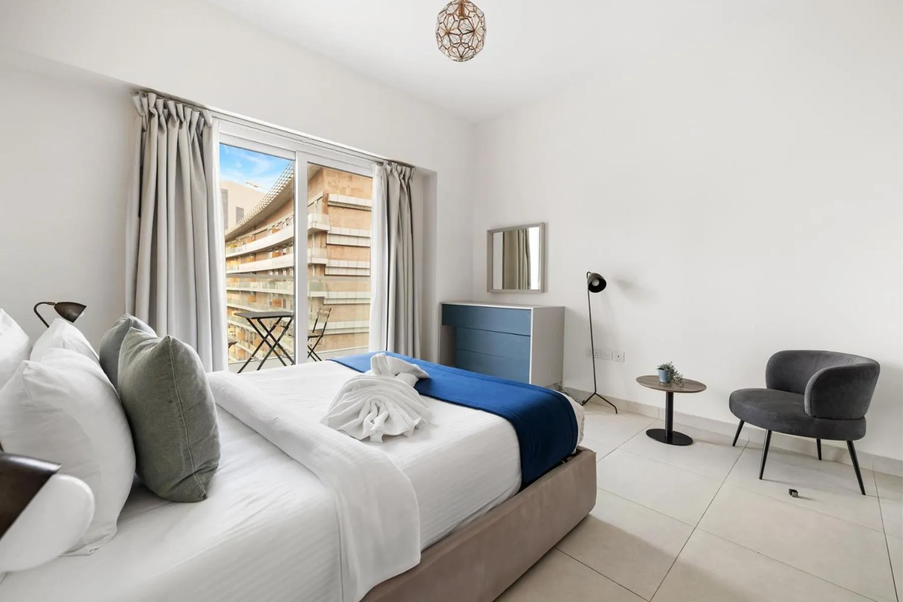 Bedroom, Bed in Unlock Metropolis Business Bay