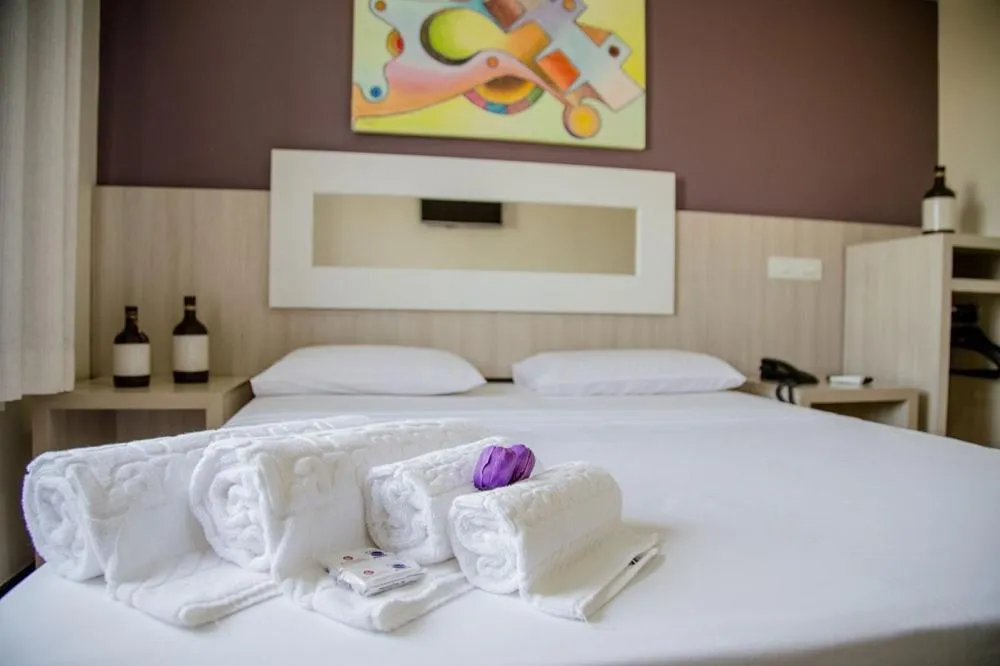 Bed in Eunapolis Plaza Hotel
