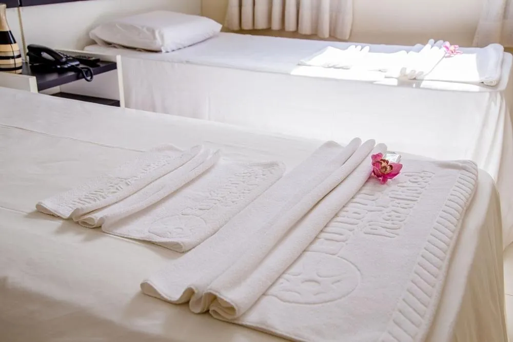 Bed in Eunapolis Plaza Hotel