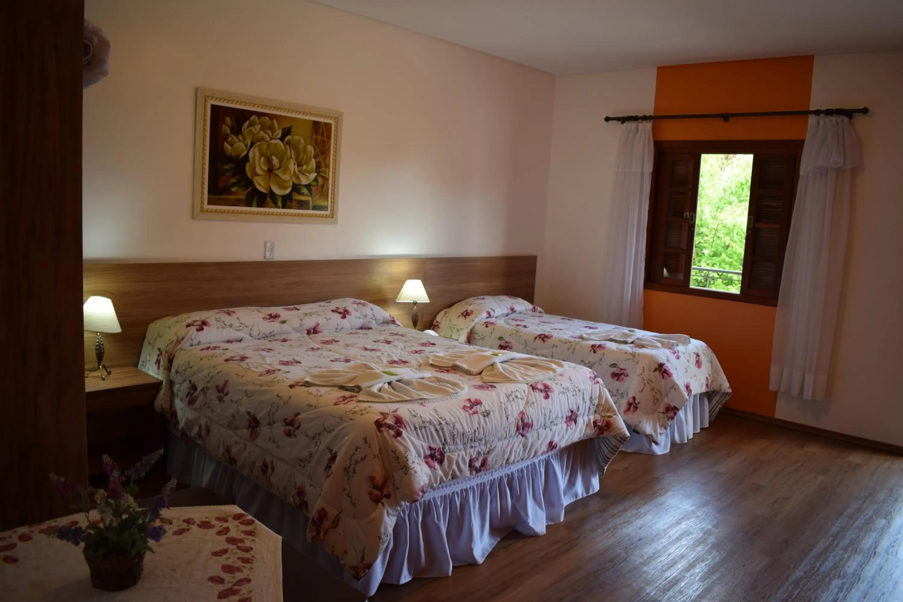 Bed in Pousada Recanto Feliz