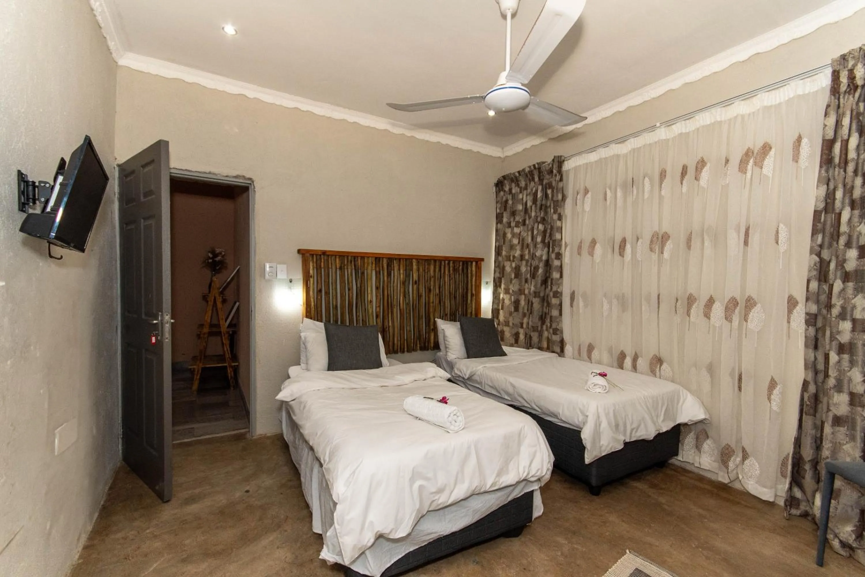 Bed in Woodpeckers Guest House