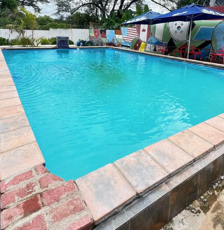 Swimming pool in Woodpeckers Guest House
