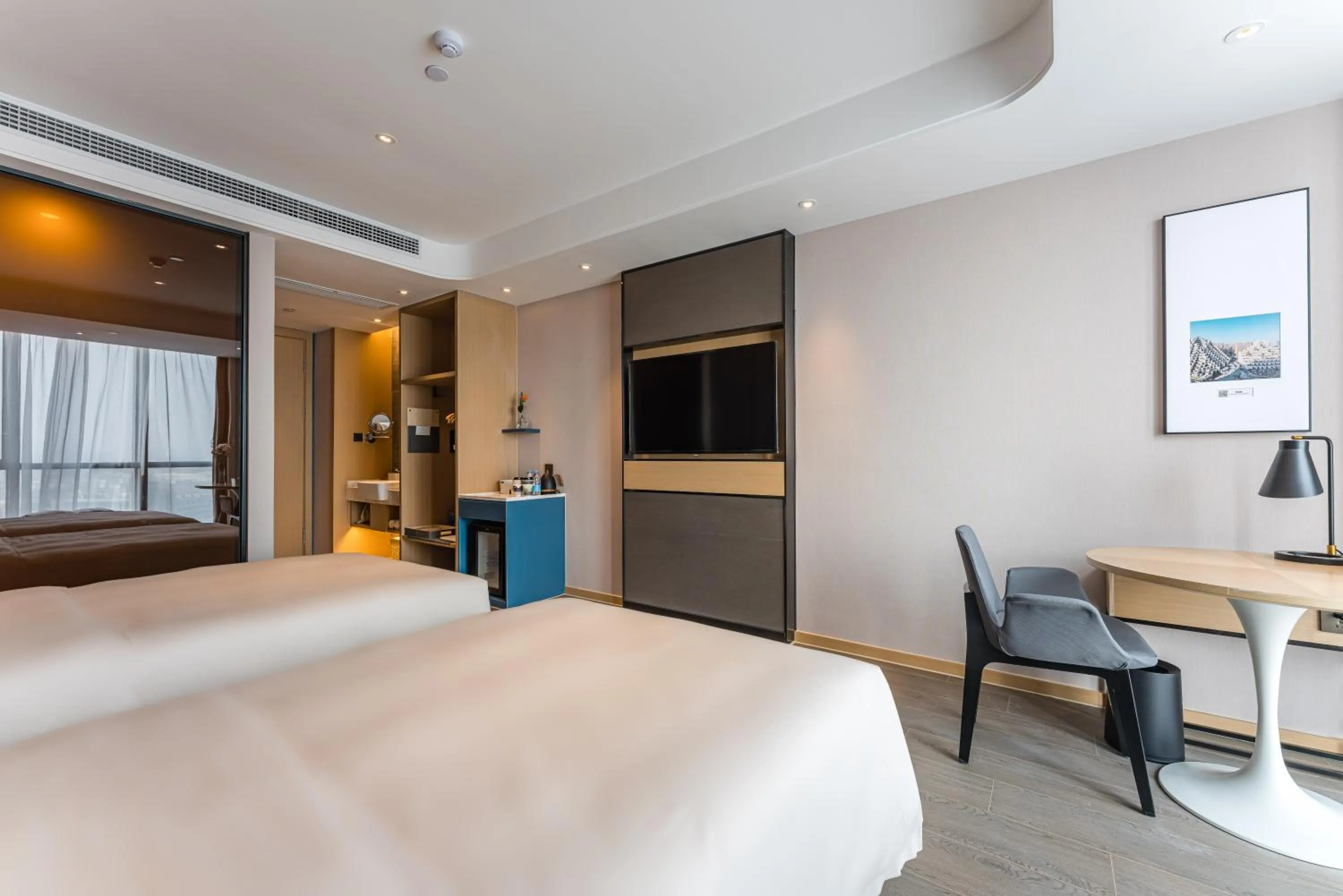 Bed in Atour Hotel Suzhou Wangting