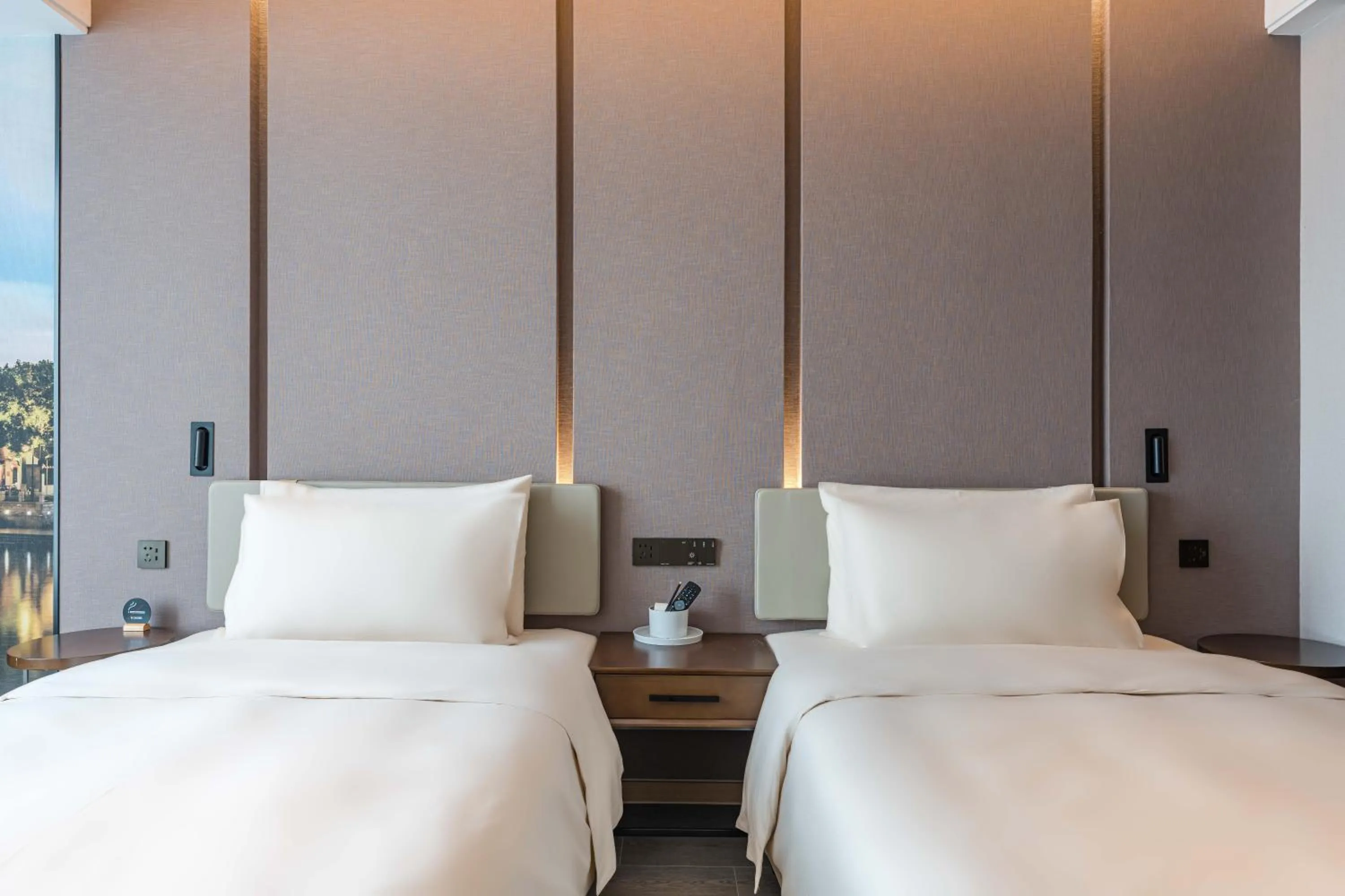 Bed in Atour Hotel Suzhou Wangting