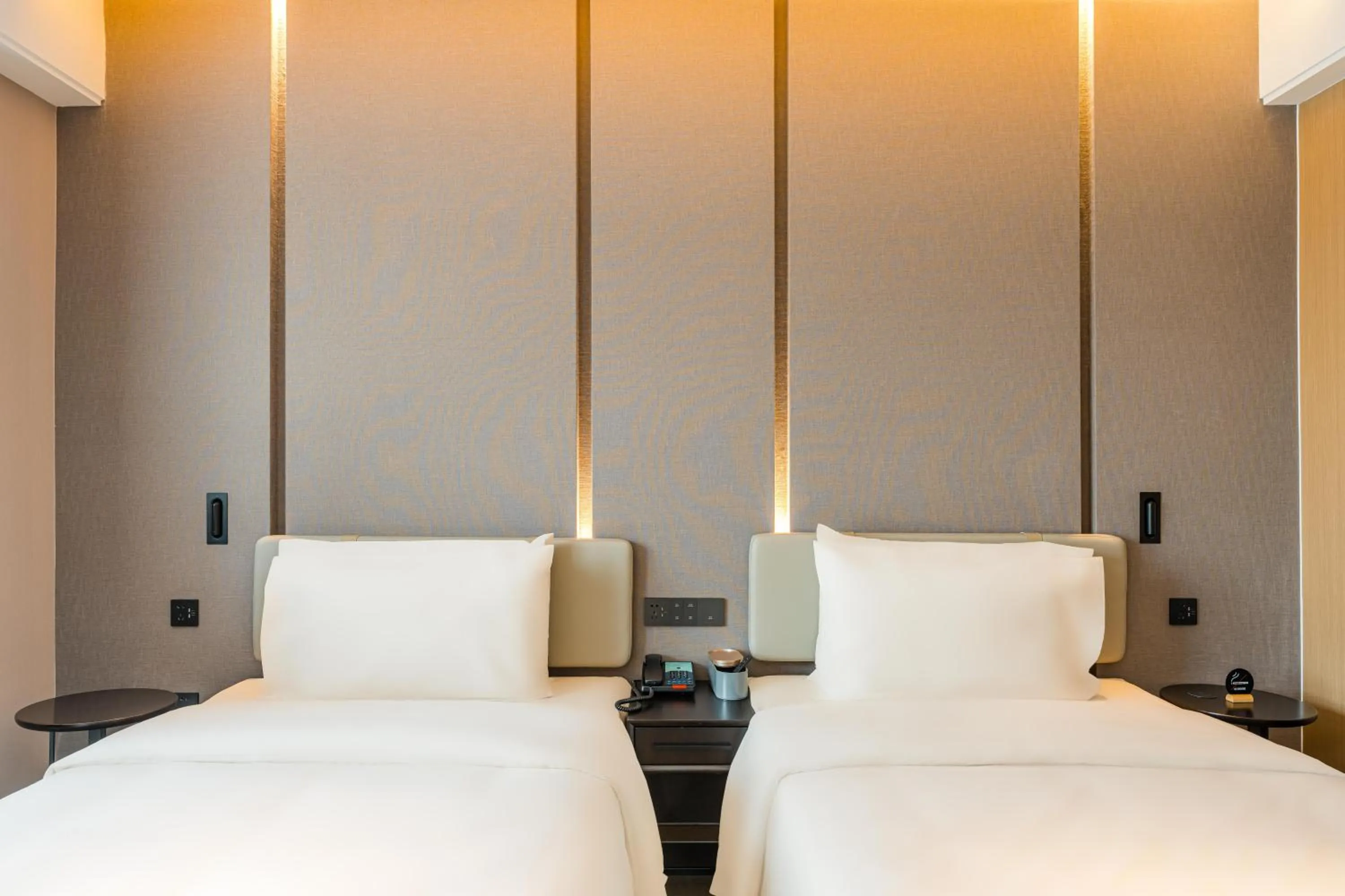 Bed in Atour Hotel Suzhou Mudu Ancient Town