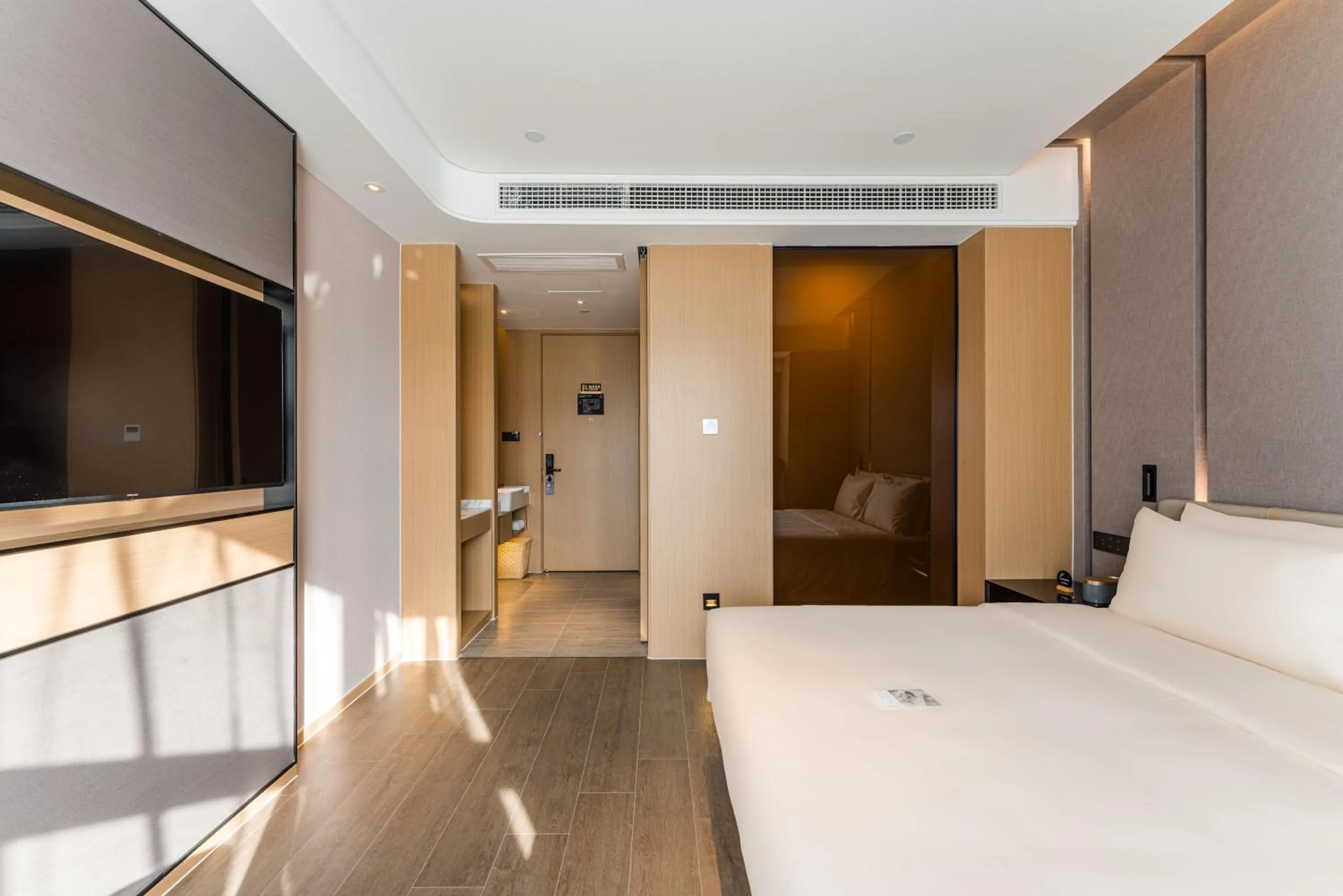 Photo of the whole room, Bed in Atour Hotel Suzhou Mudu Ancient Town