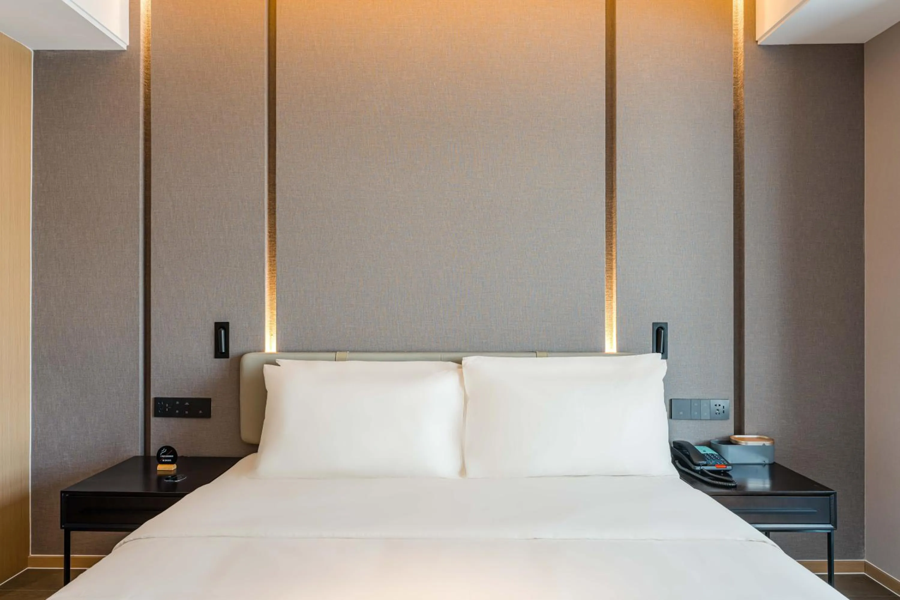 Bed in Atour Hotel Suzhou Mudu Ancient Town