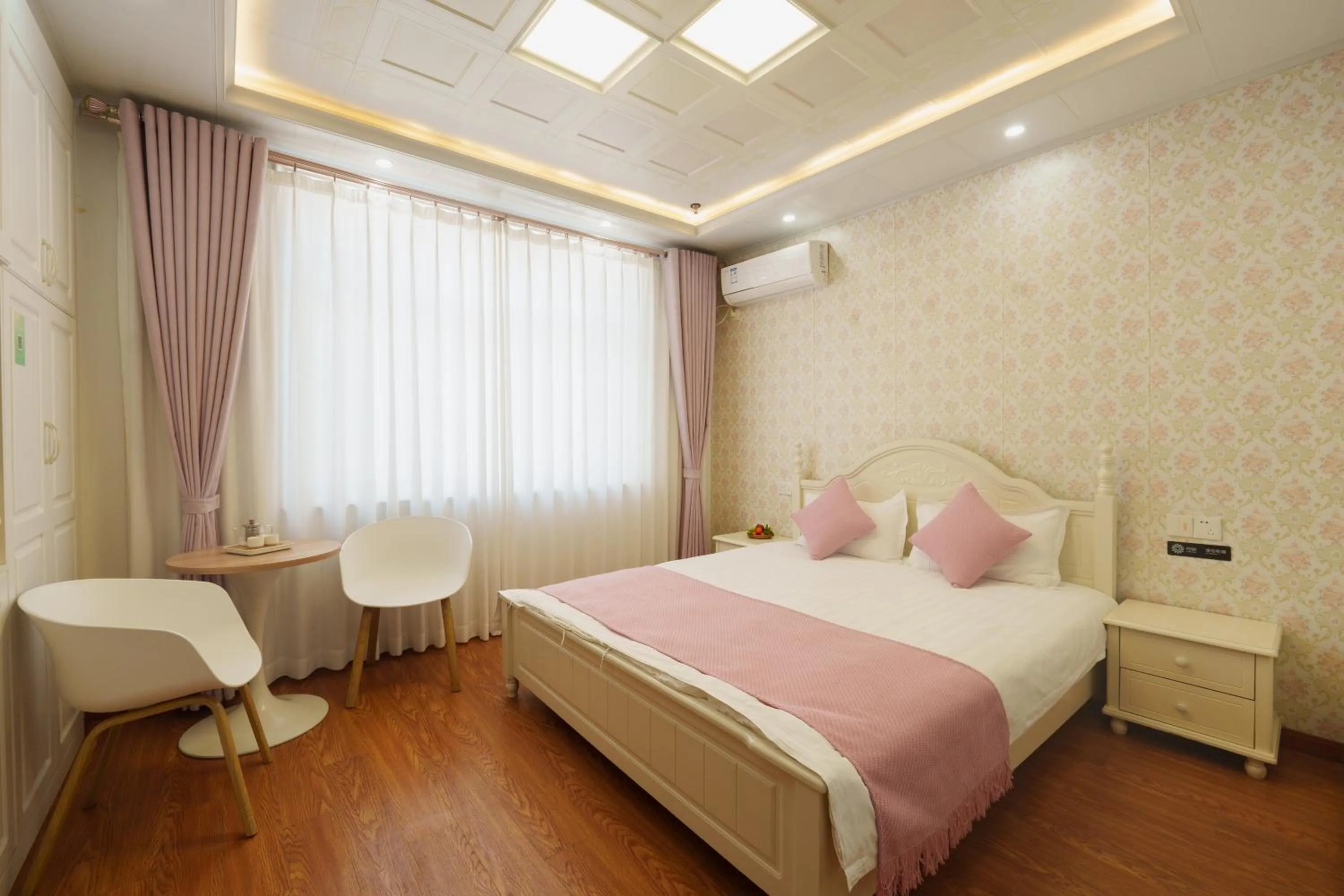 Bed in Floral Yilanxuan Zhouzhuang Hotel