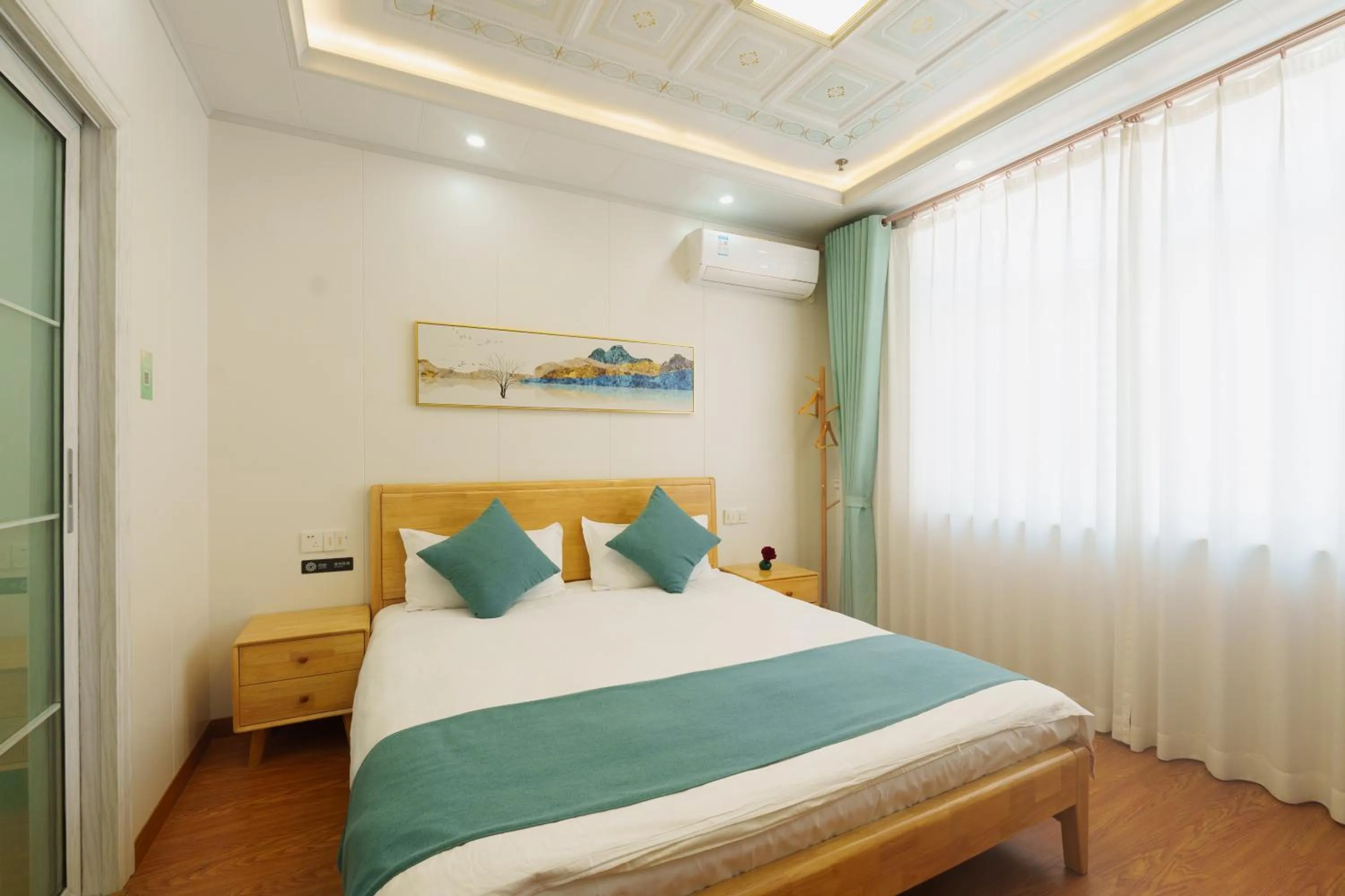 Bed in Floral Yilanxuan Zhouzhuang Hotel