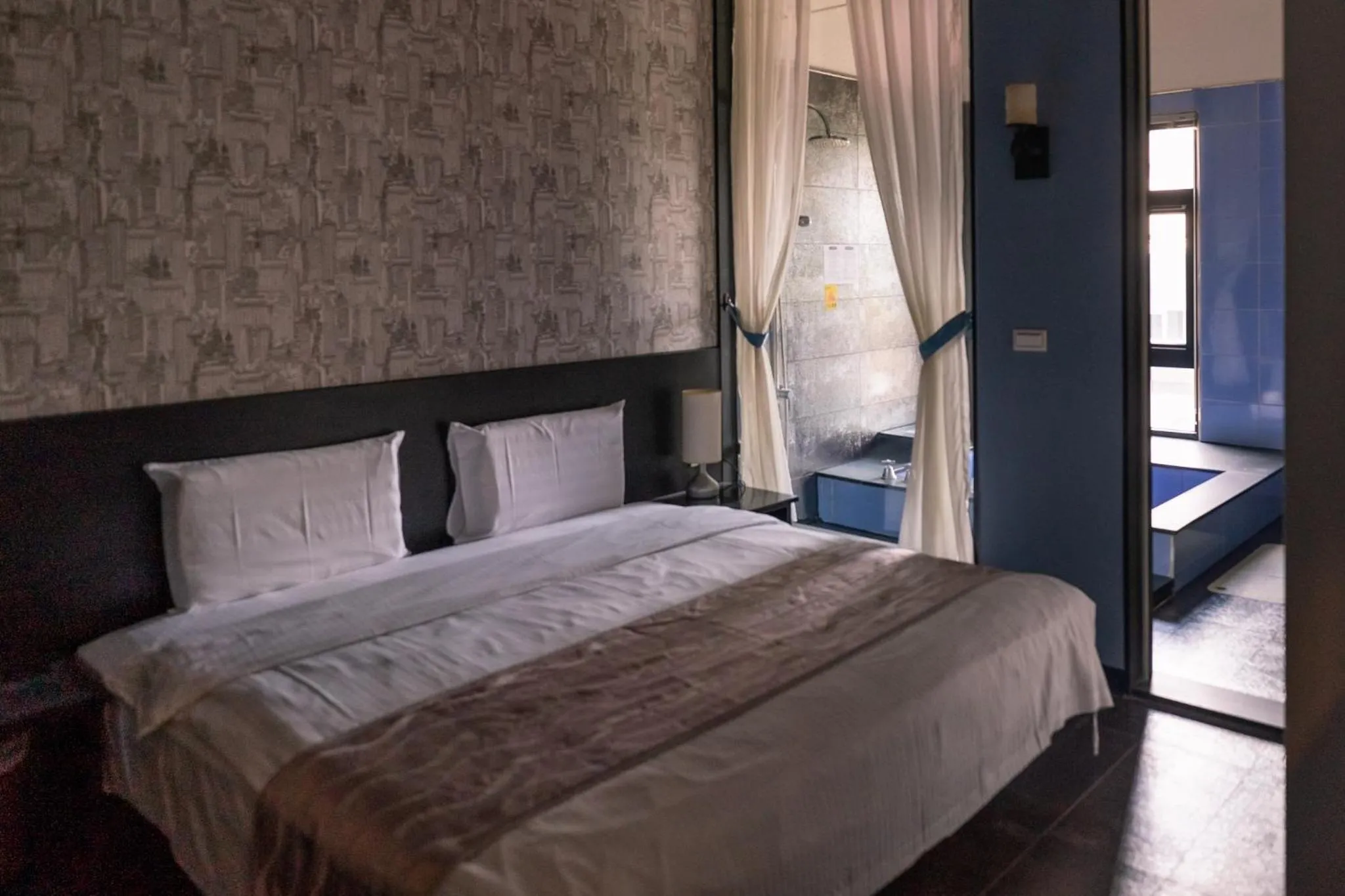 Photo of the whole room, Bed in 58˚ Hotspring Hotel