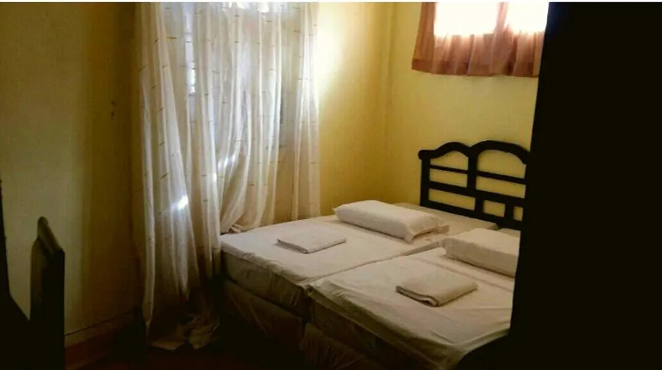 Bed in JR Pension House