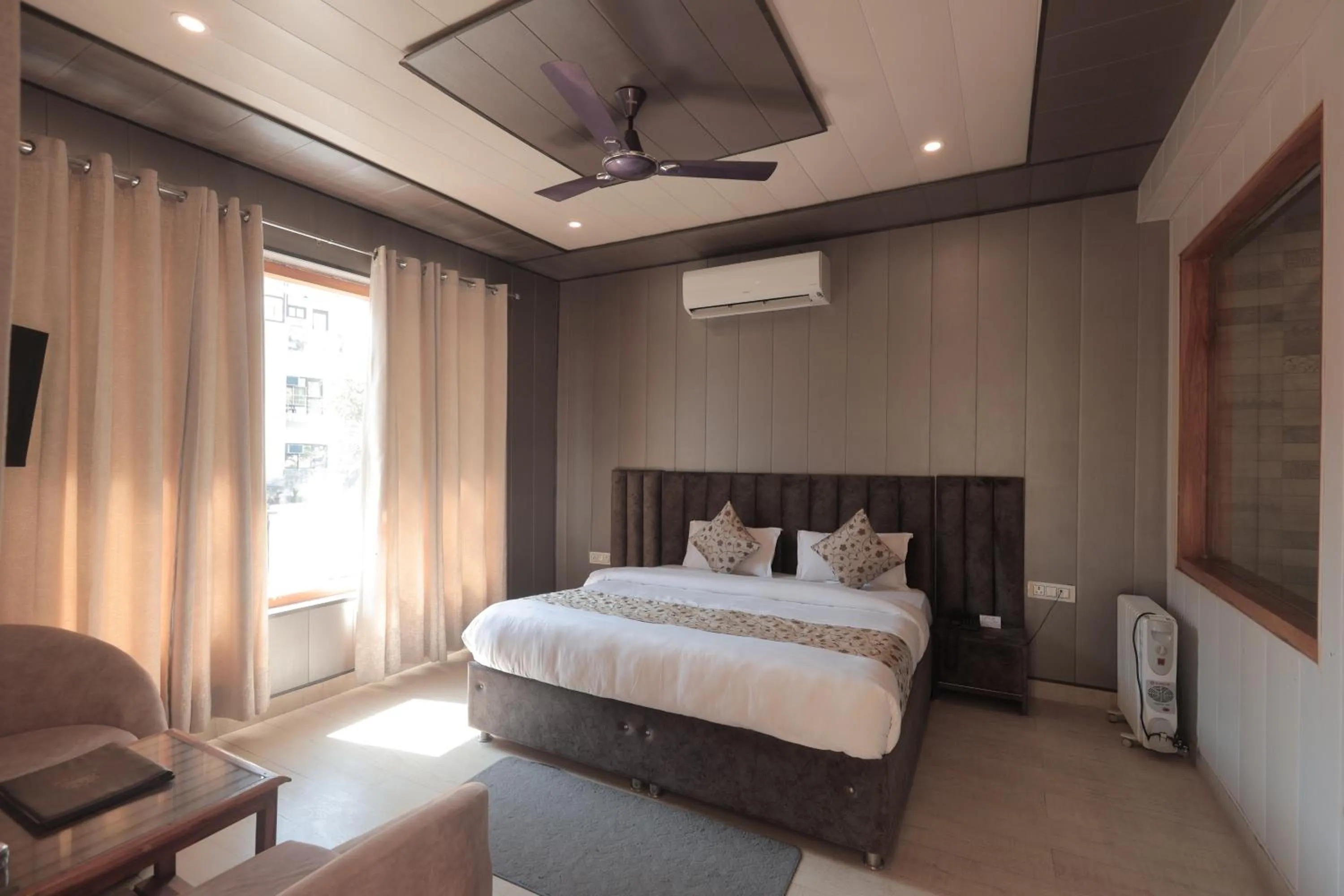 Bed in Yogved Hospitality & Resort