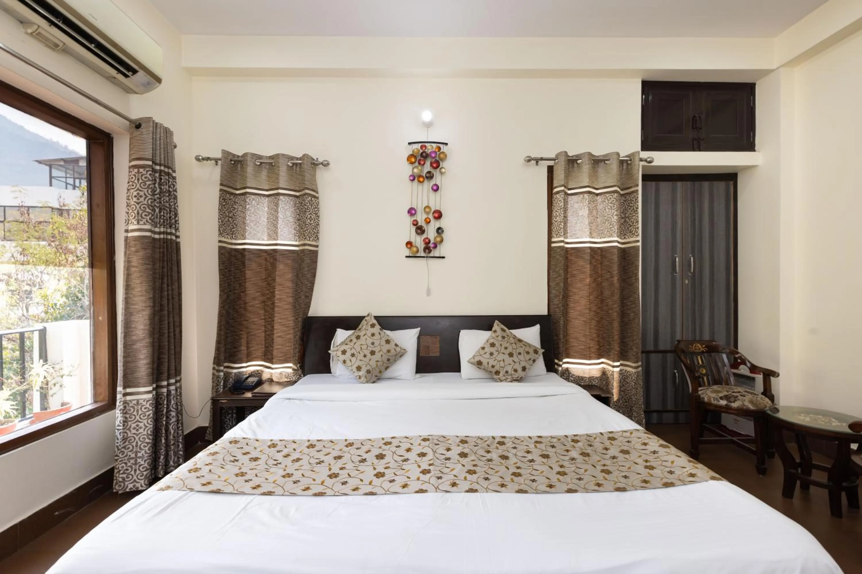 Bed in Yogved Hospitality & Resort