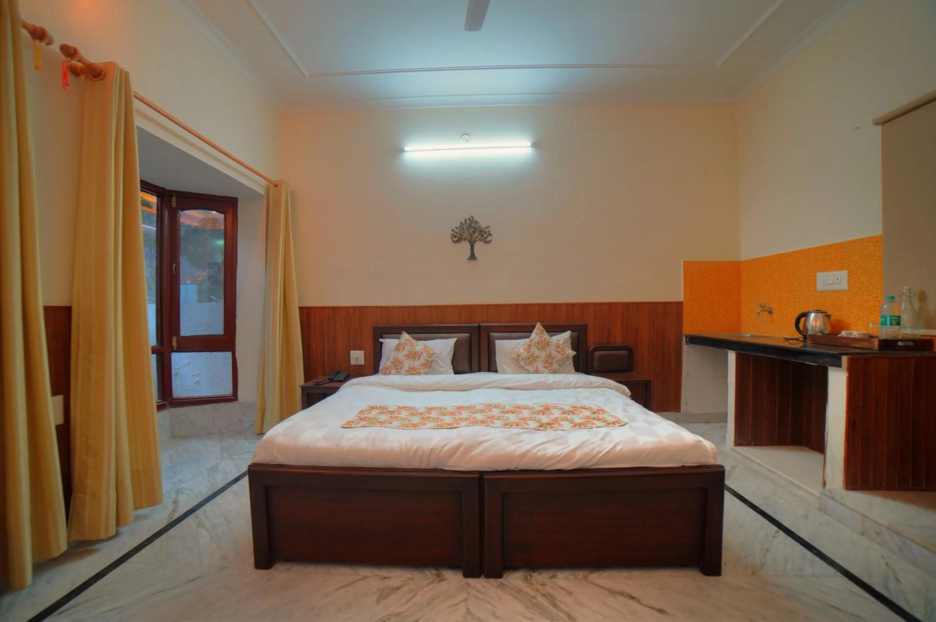 Bed in Yogved Hospitality & Resort