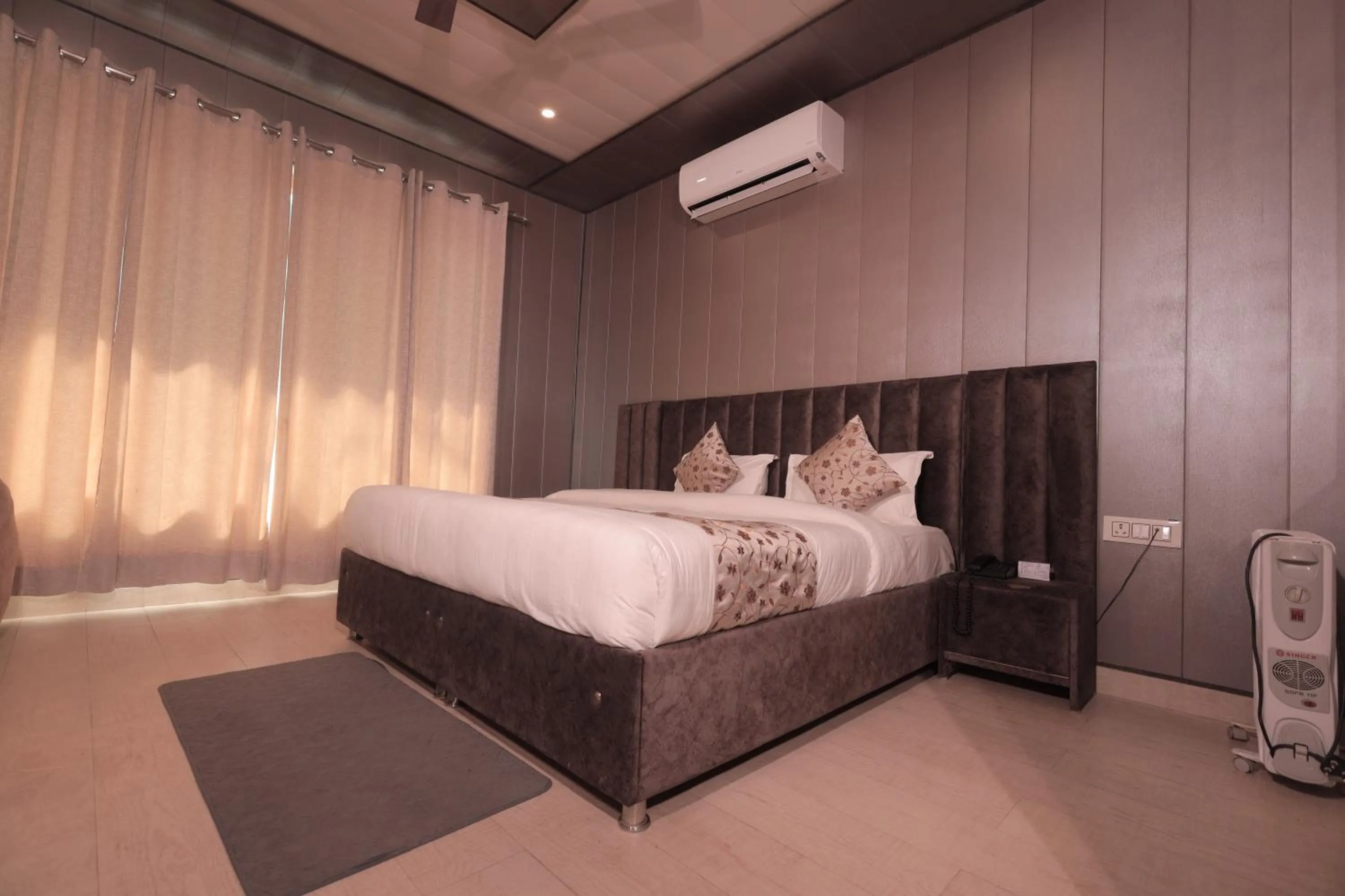 Bed in Yogved Hospitality & Resort