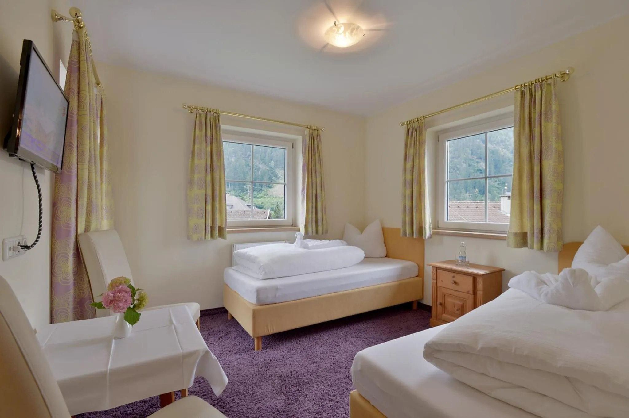 Photo of the whole room, Bed in Posthotel Mayrhofen