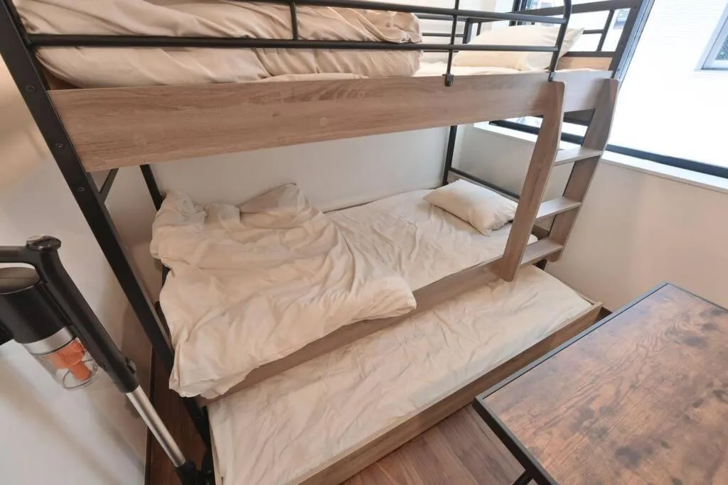 Bed in Stylewood Nishi-Shinjuku by Tranova