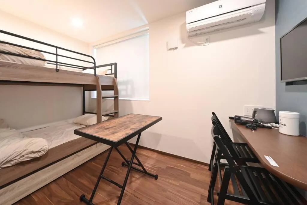 Bed in Stylewood Nishi-Shinjuku by Tranova