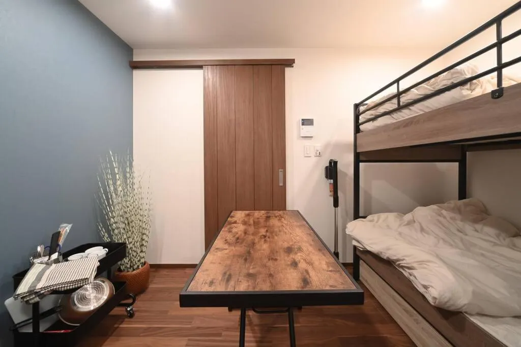 Bed in Stylewood Nishi-Shinjuku by Tranova