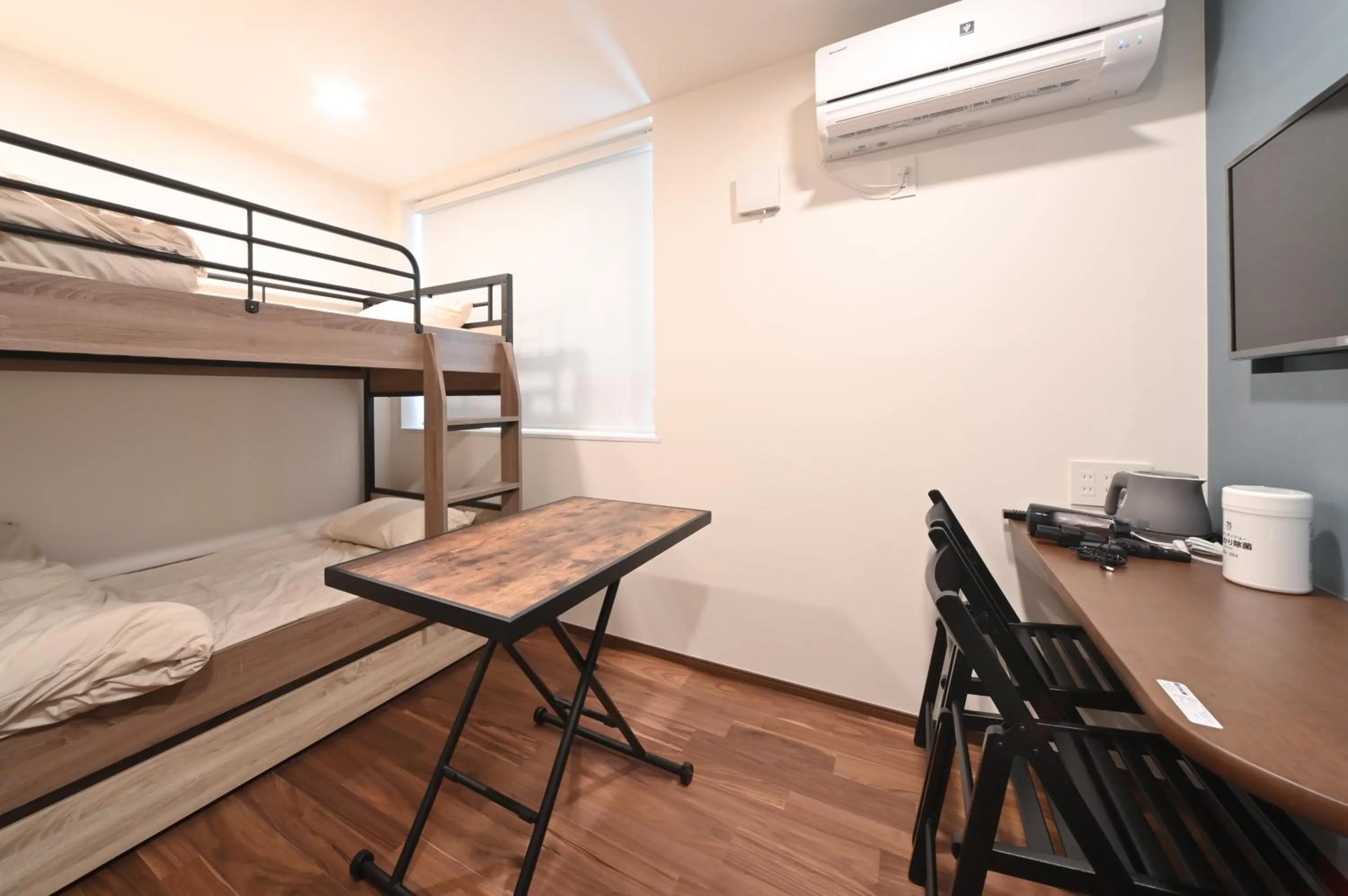 Bed in Stylewood Nishi-Shinjuku by Tranova