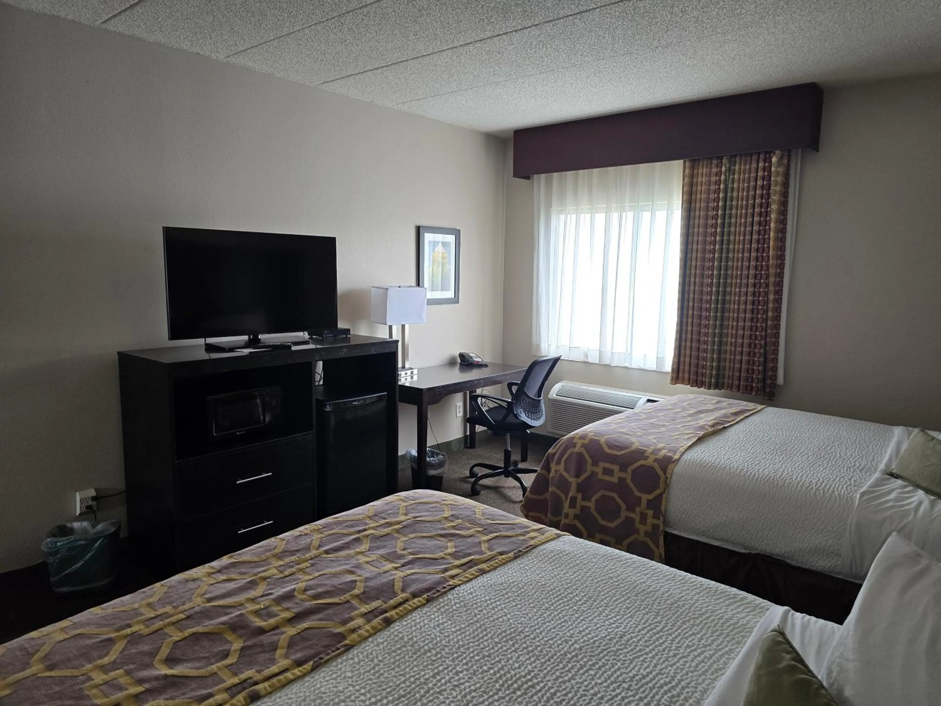 Bedroom, Bed in Baymont by Wyndham Janesville